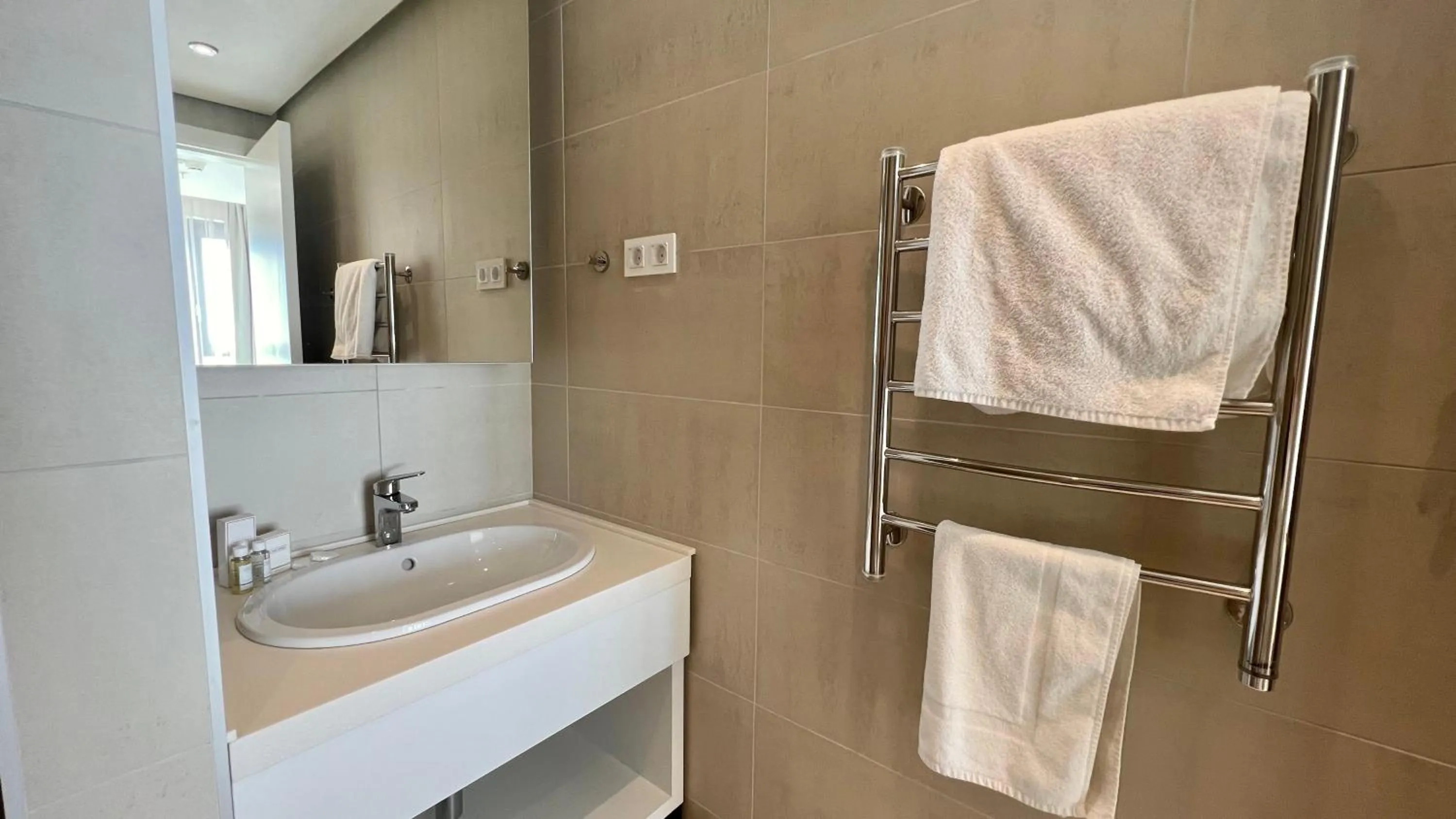 Bathroom in Sunraf Luxe Apartments