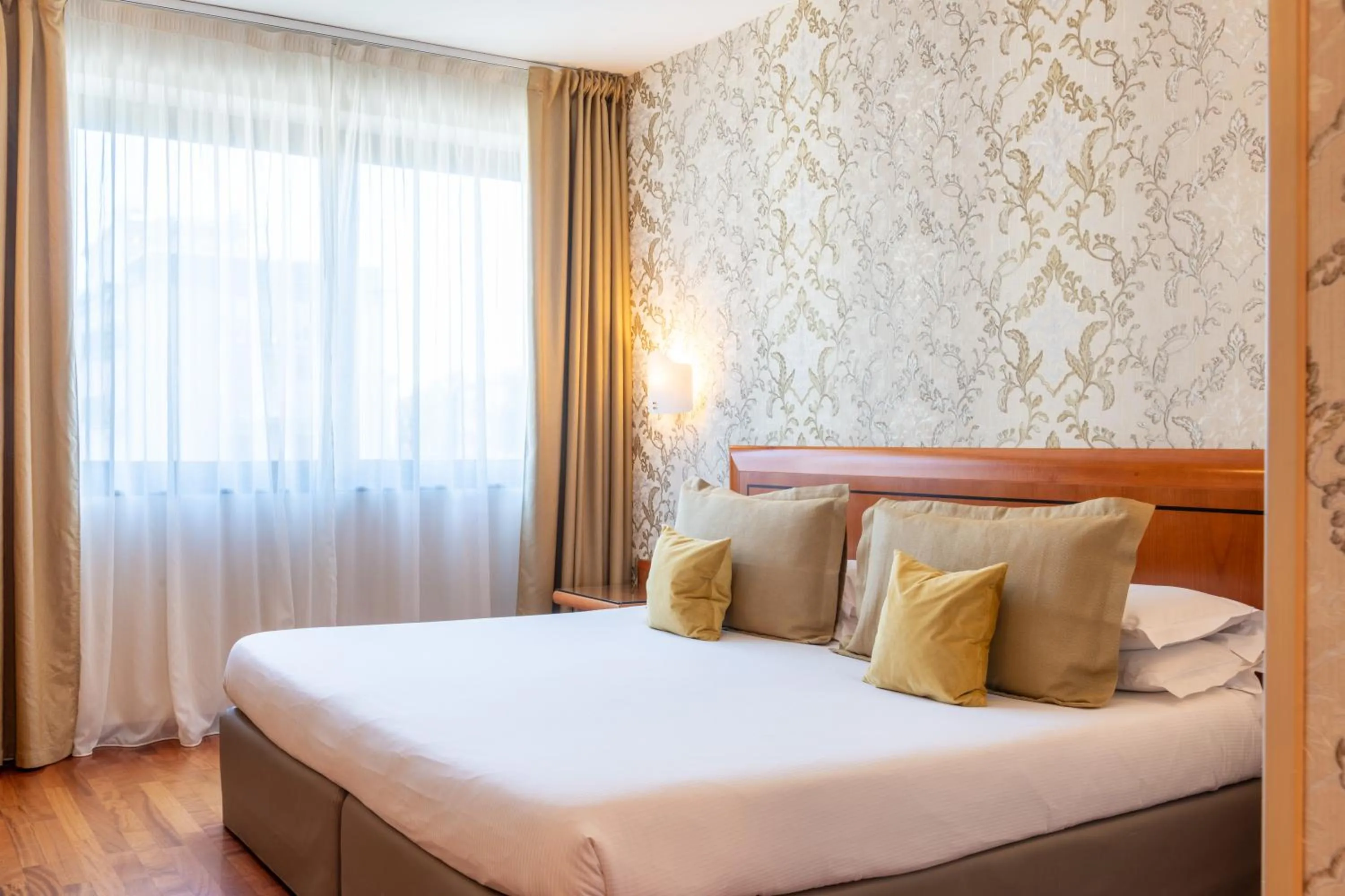 Bed in Hotel Palace Verona