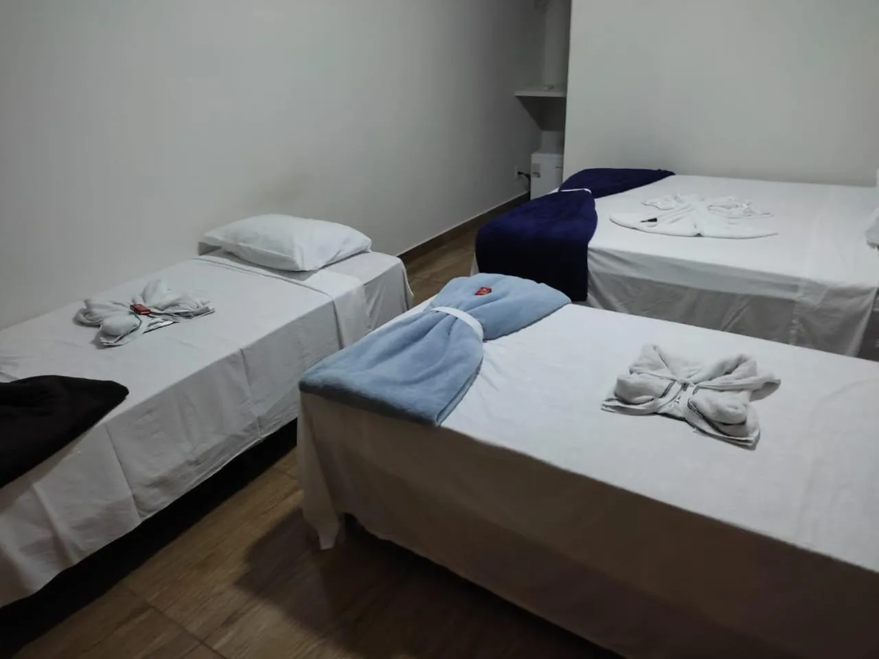 Bed in Pousada RIOSTOUR