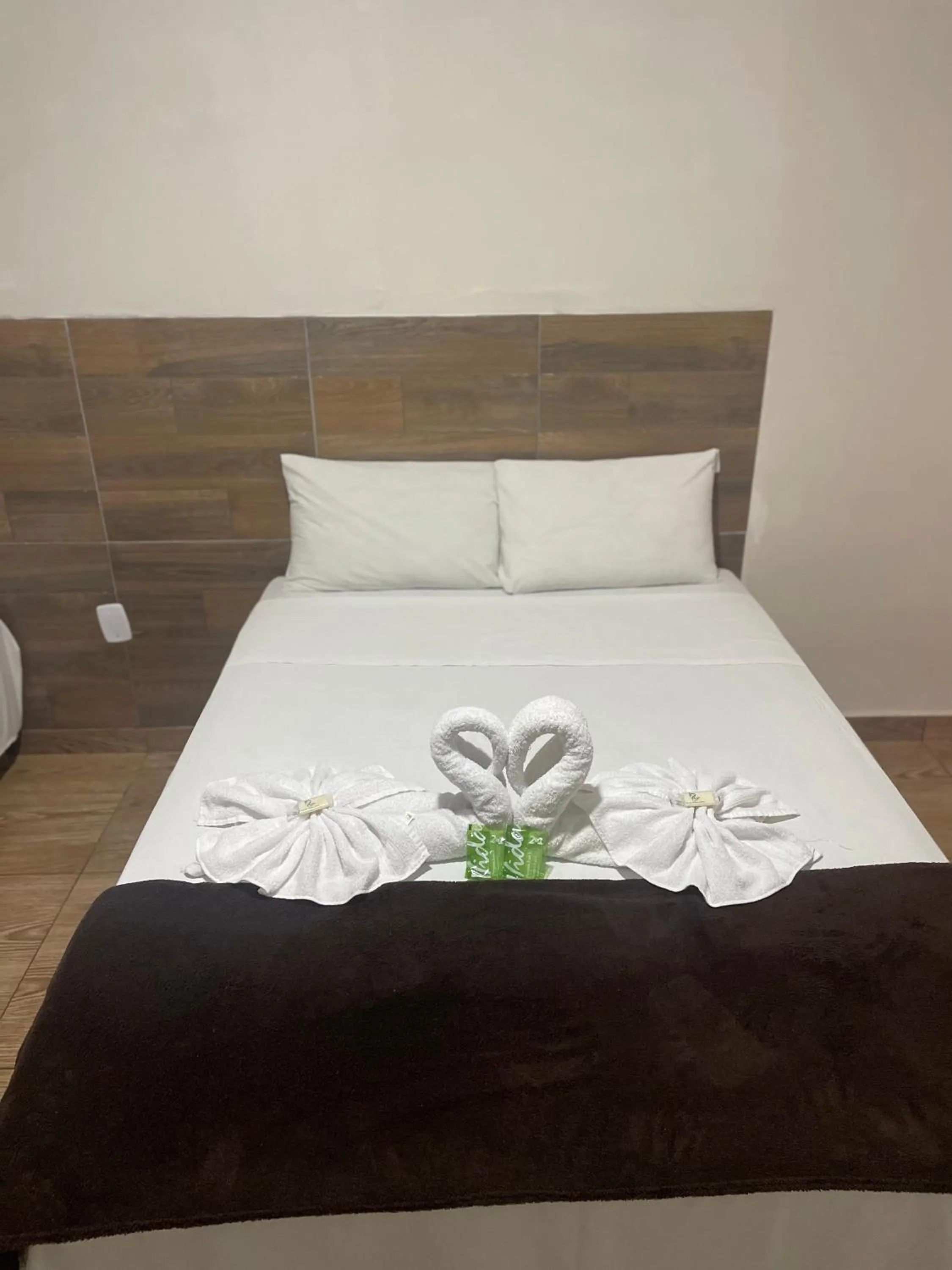 Bed in Pousada RIOSTOUR