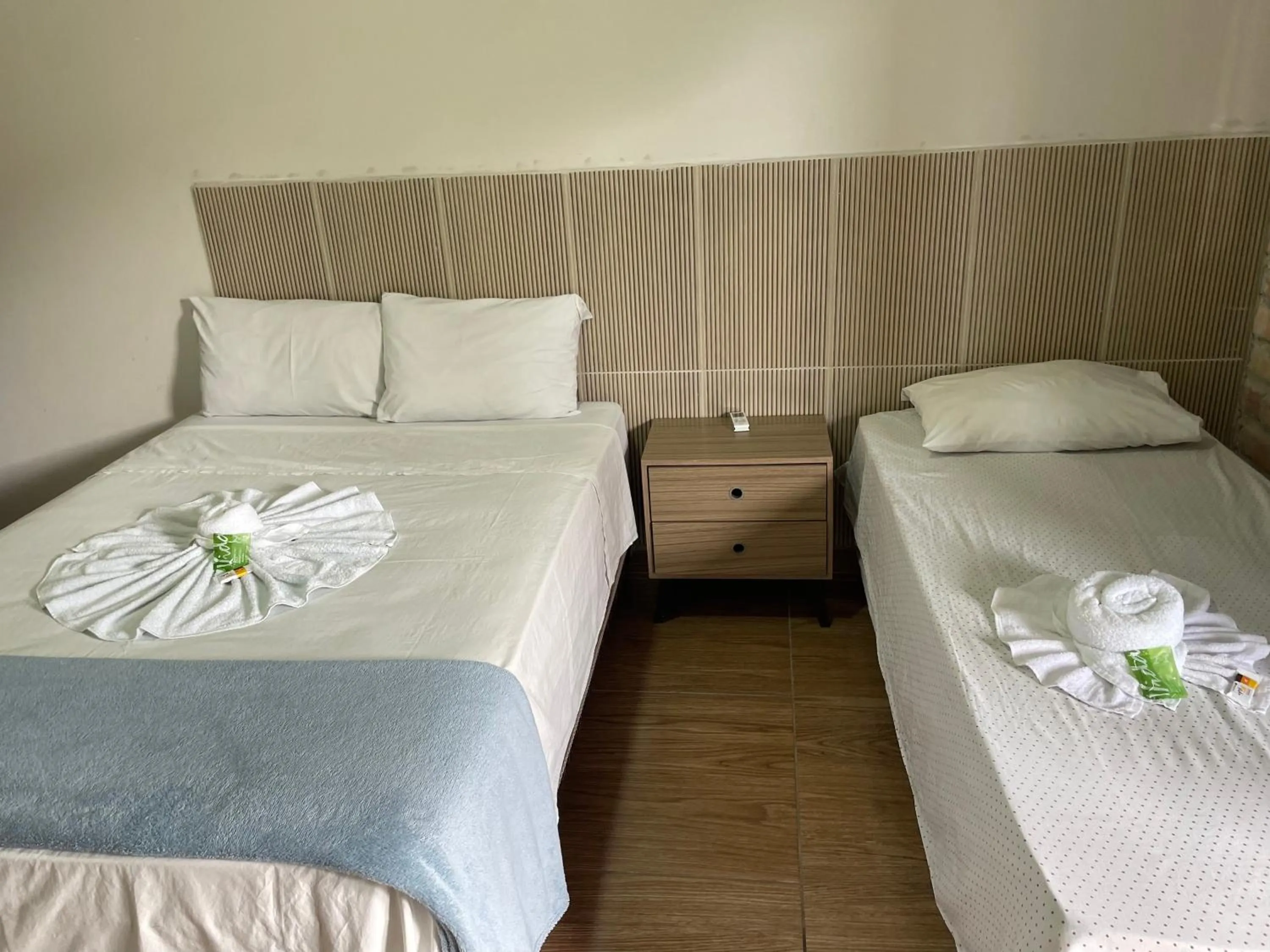Bed in Pousada RIOSTOUR