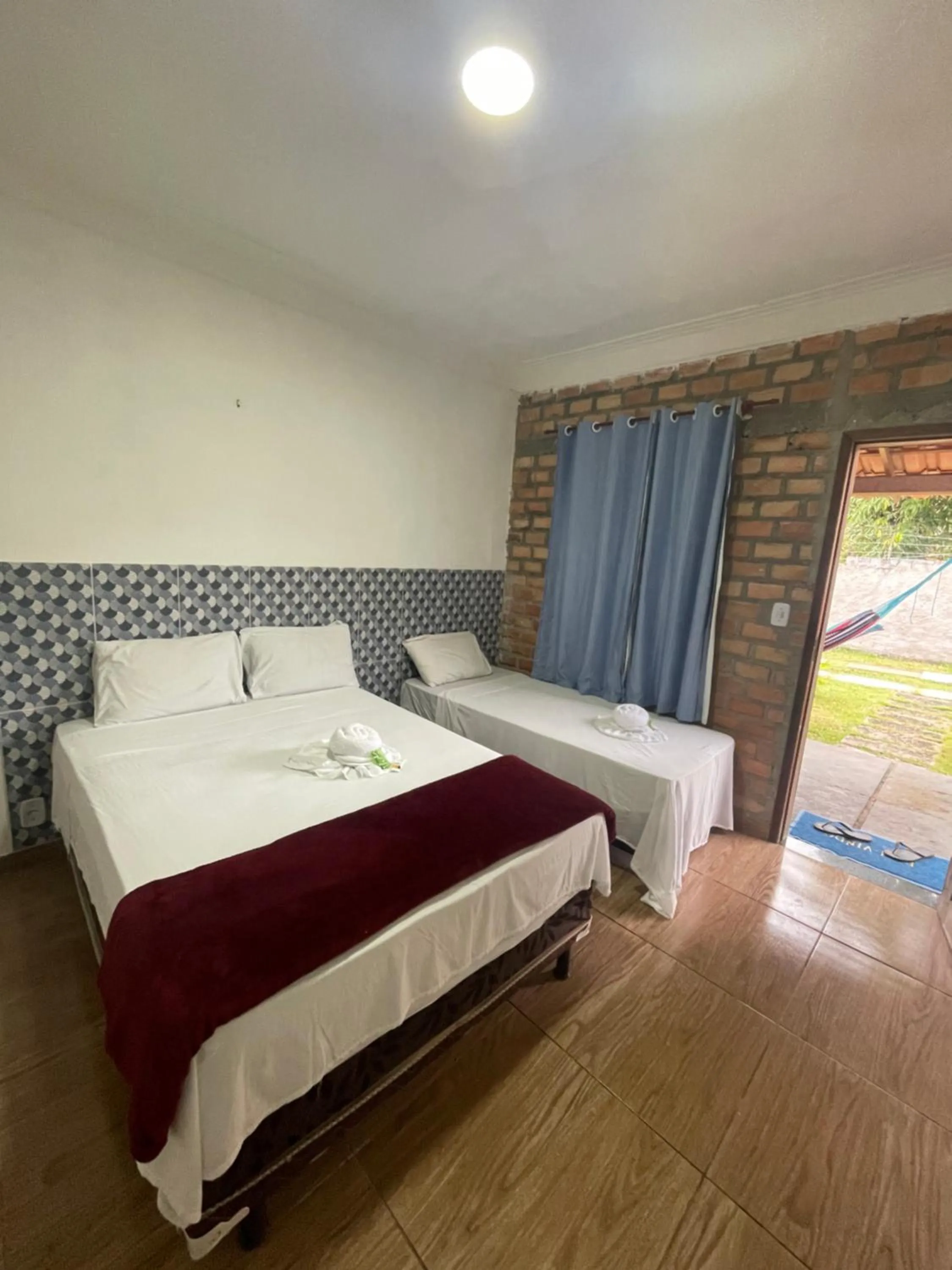 Bed in Pousada RIOSTOUR