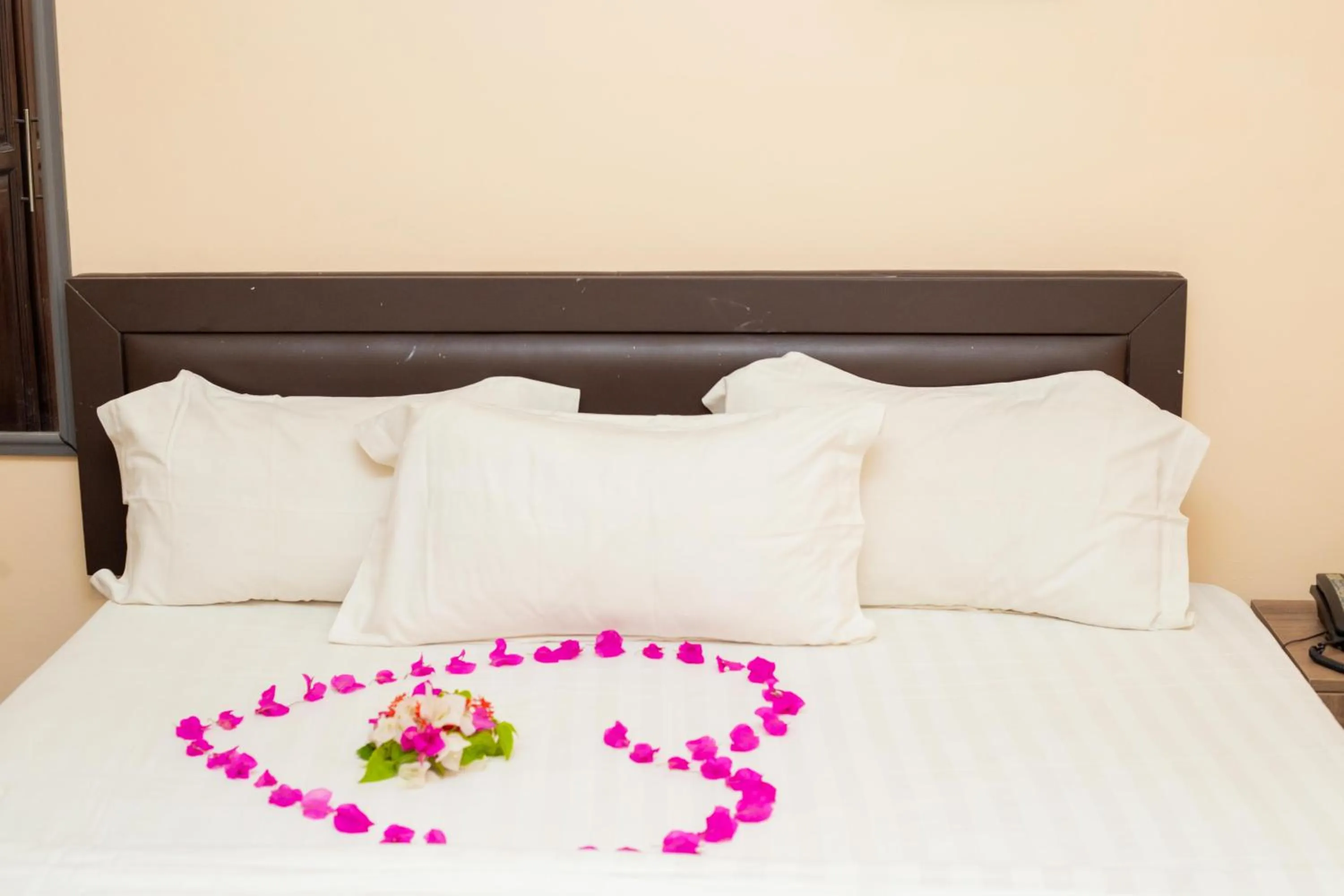 Bed in High Level Apartment