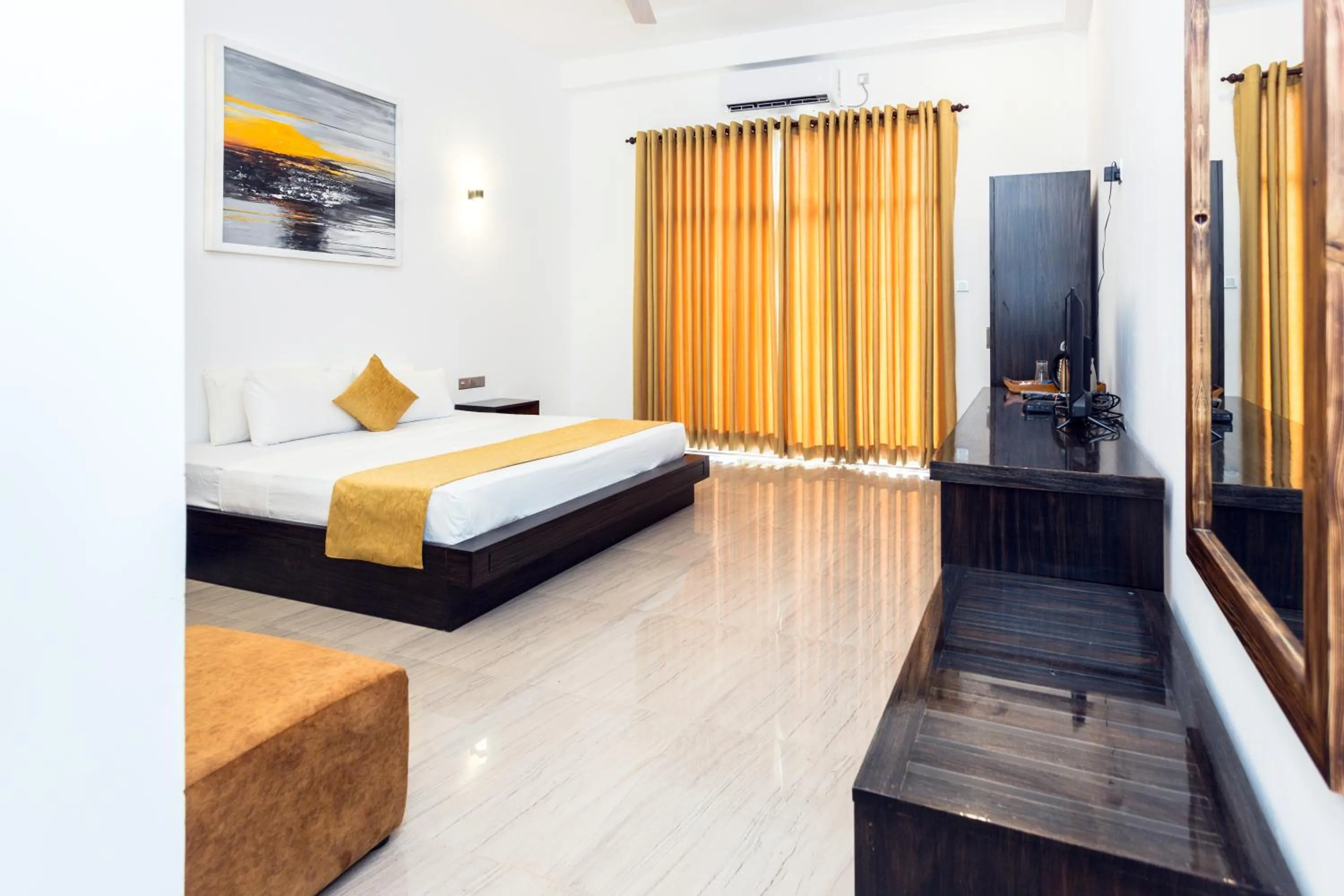 Bed in Polhena Grand Resort & Banquet