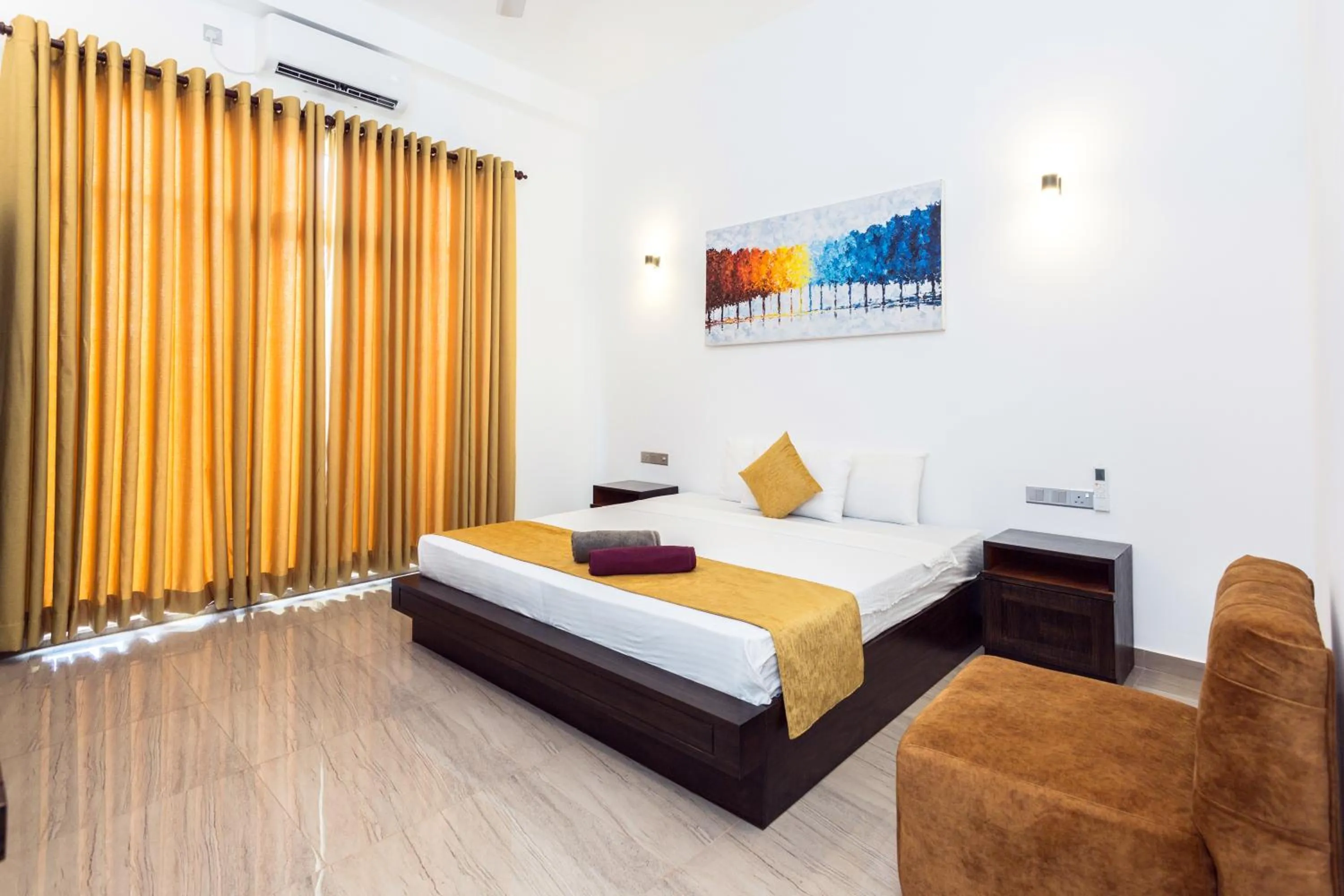 Bed in Polhena Grand Resort & Banquet