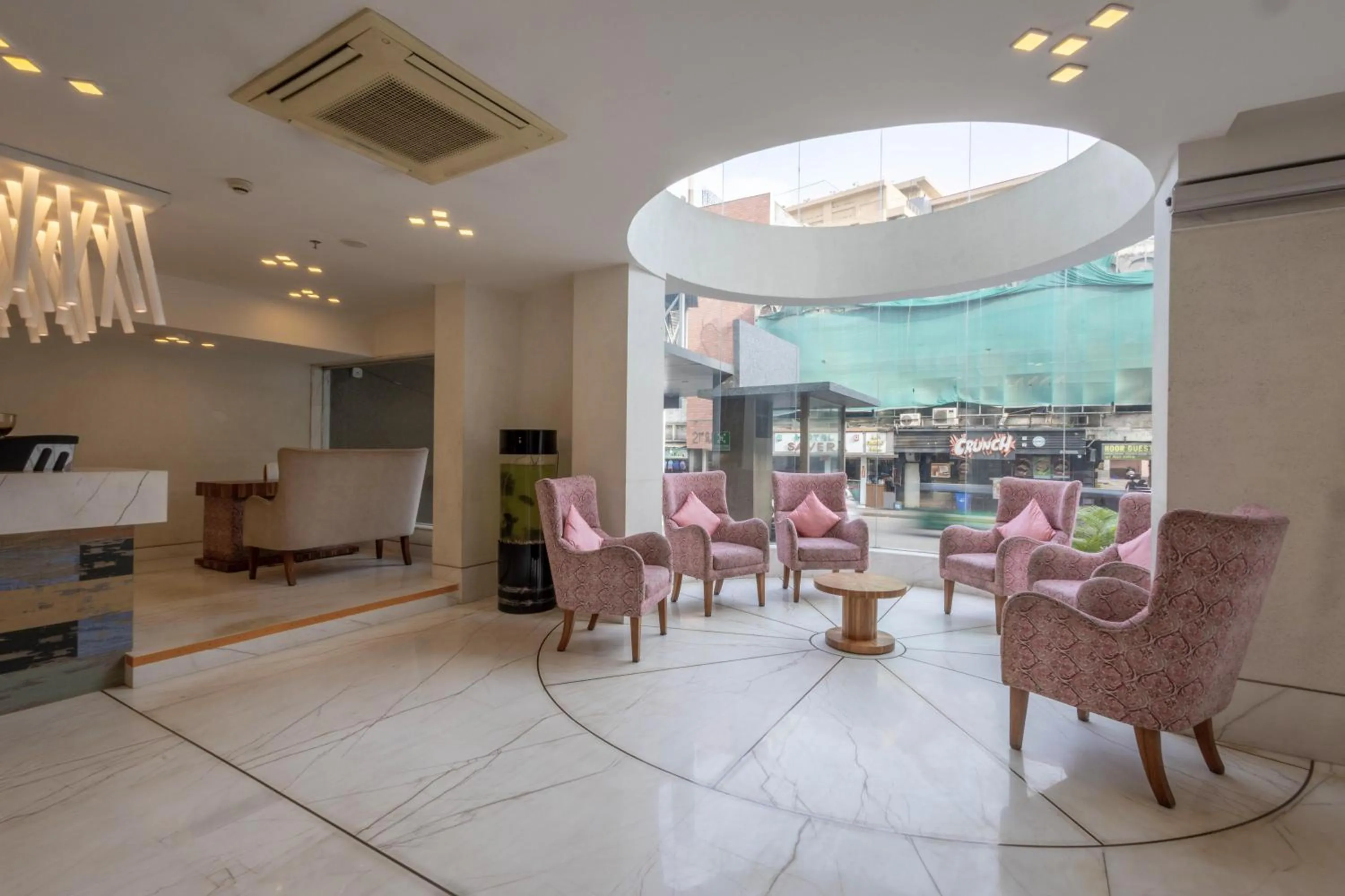 Seating area in De Glance Hotel, Near Surat Railway Station