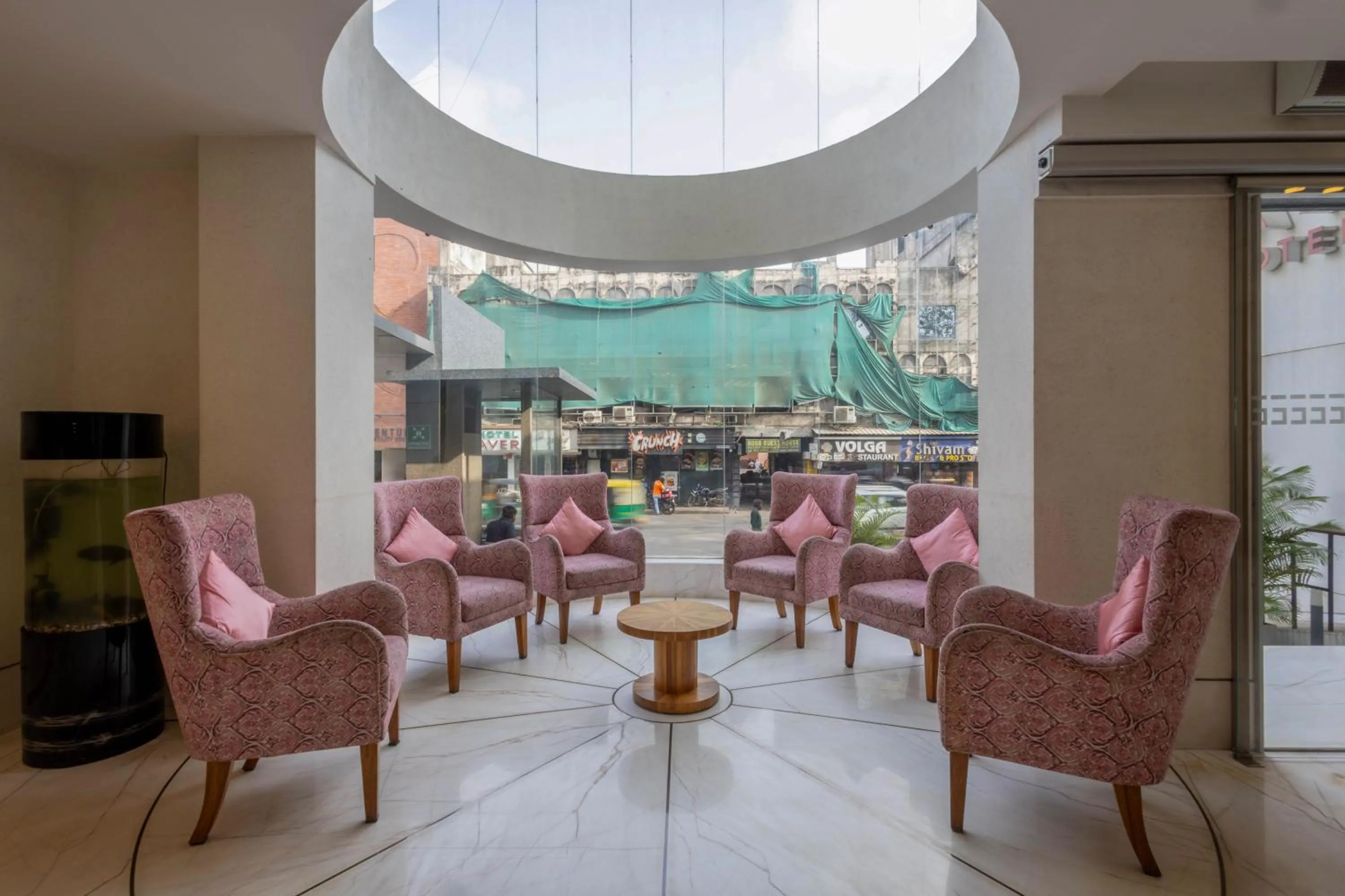 Seating area in De Glance Hotel, Near Surat Railway Station