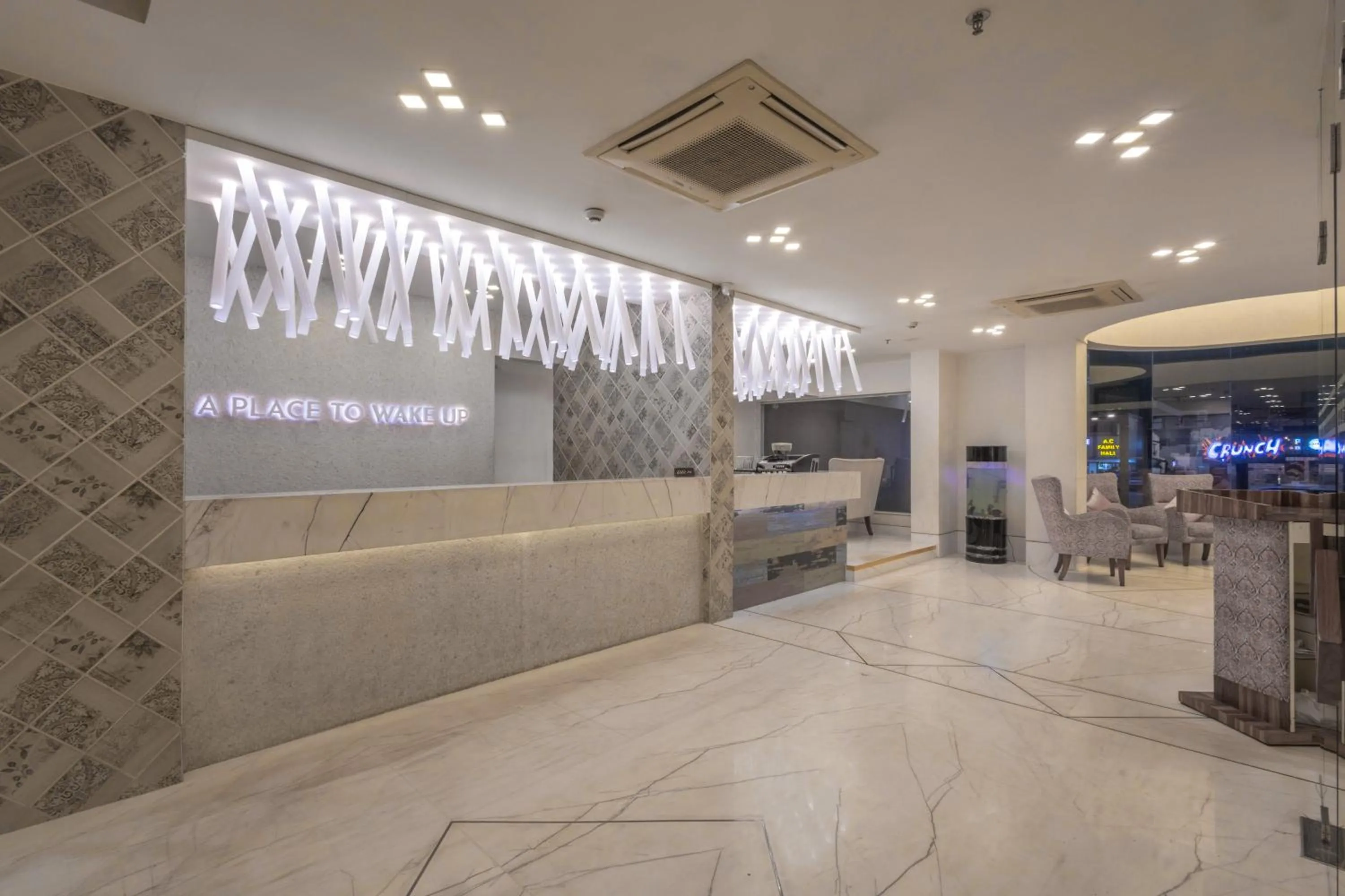 Lobby or reception in De Glance Hotel, Near Surat Railway Station