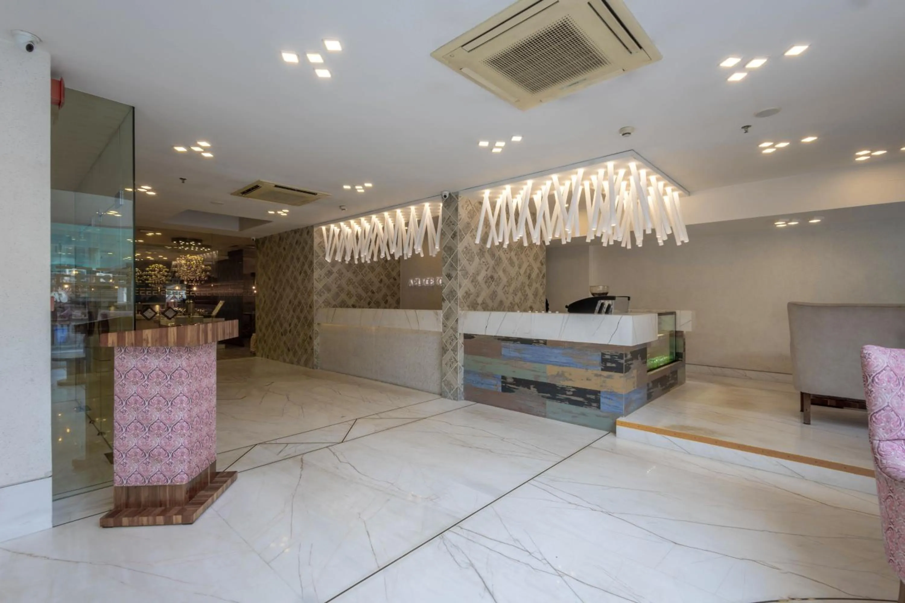 Lobby or reception in De Glance Hotel, Near Surat Railway Station