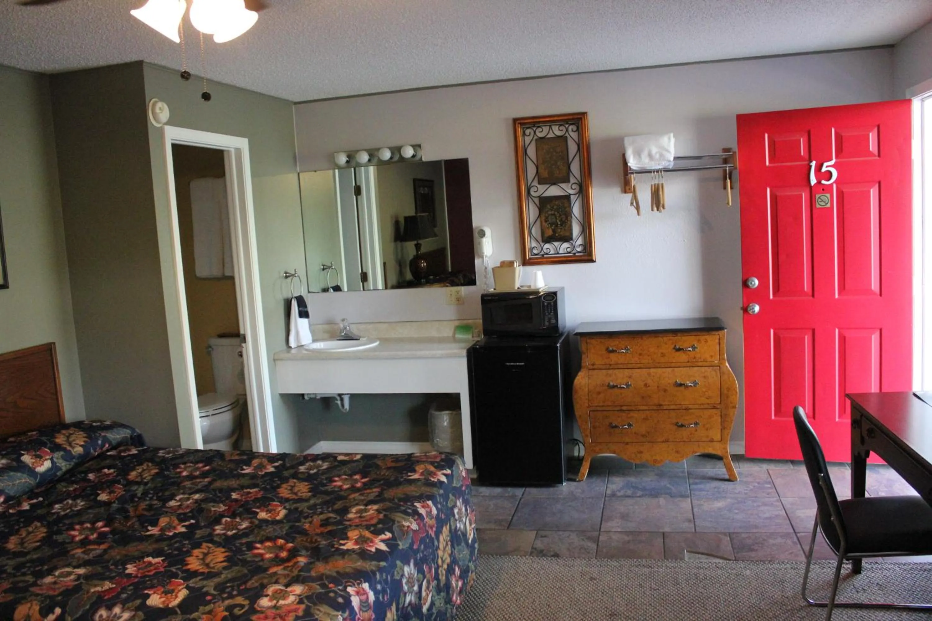 Bed in Brydan Suites