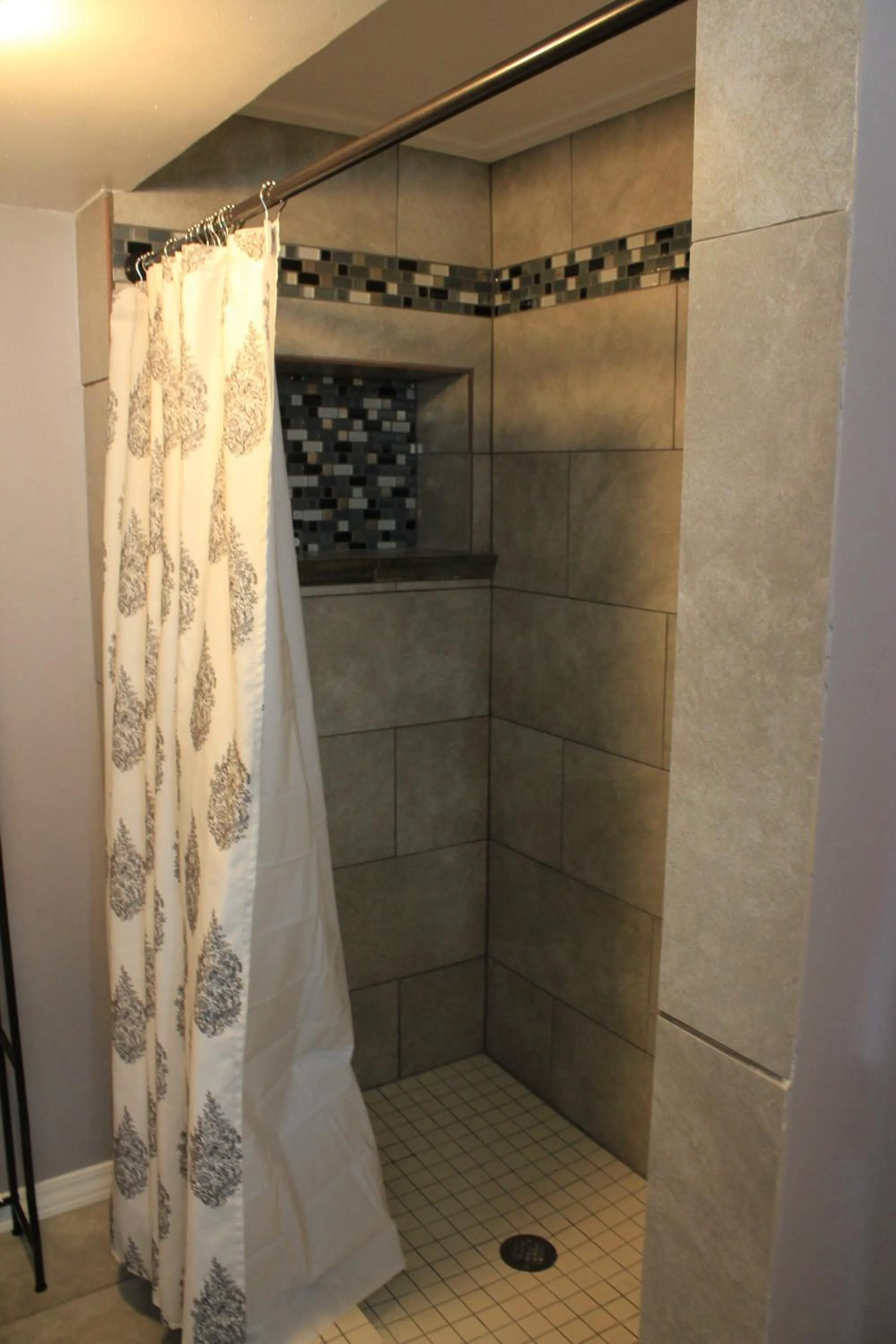 Shower in Brydan Suites