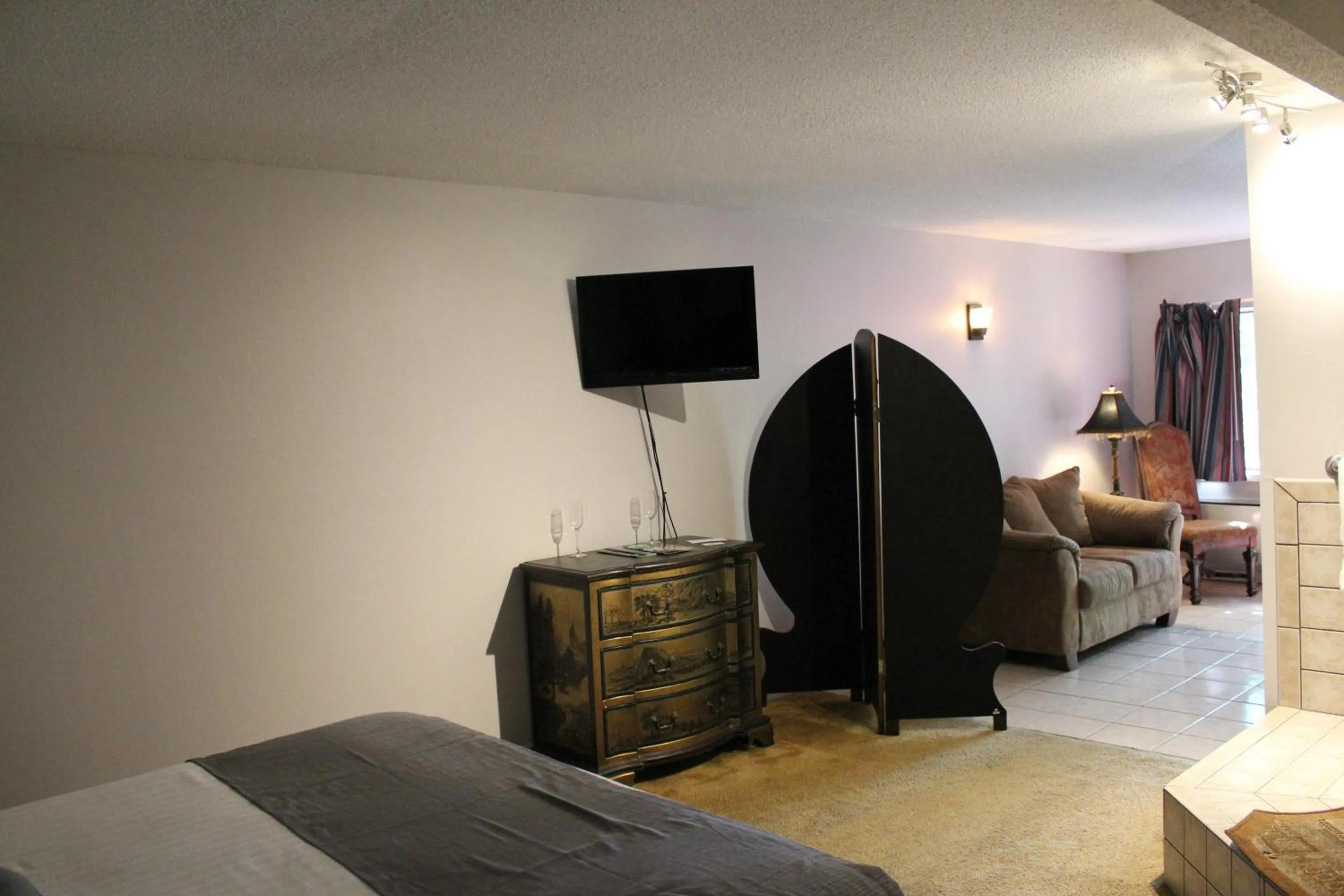 Bed in Brydan Suites