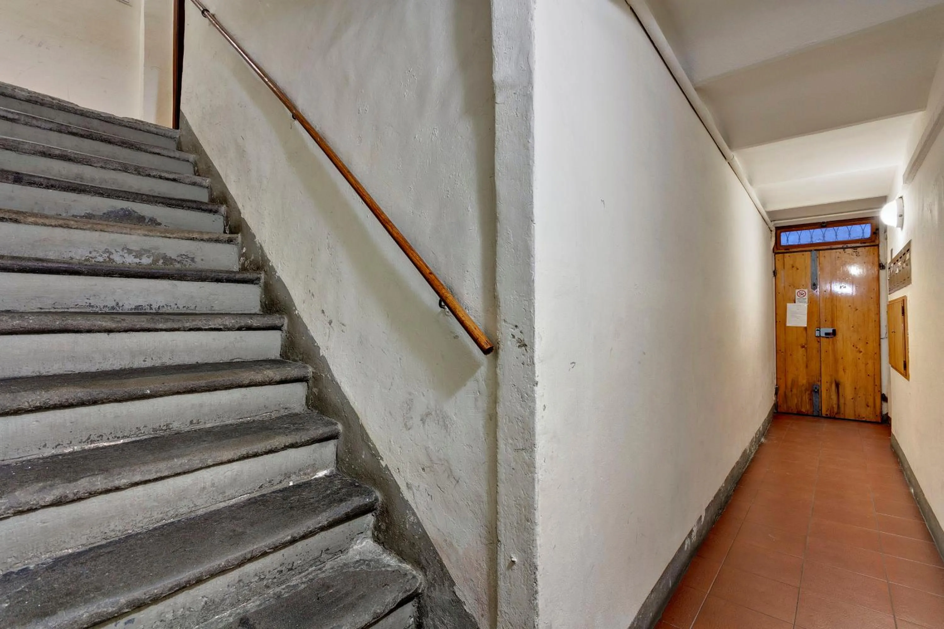 Facade/entrance in Victor Apartment by Mamo Florence