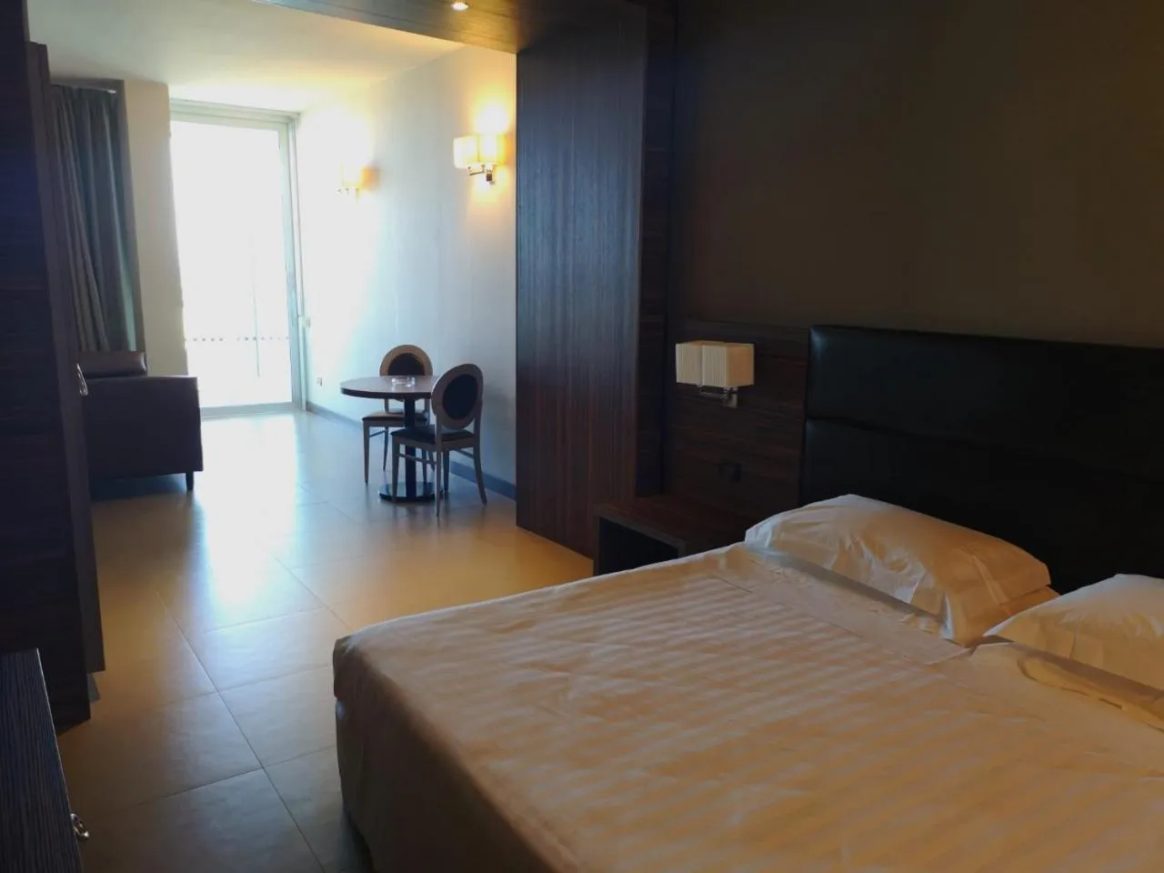 Bedroom, Bed in Waldorf Suite Hotel