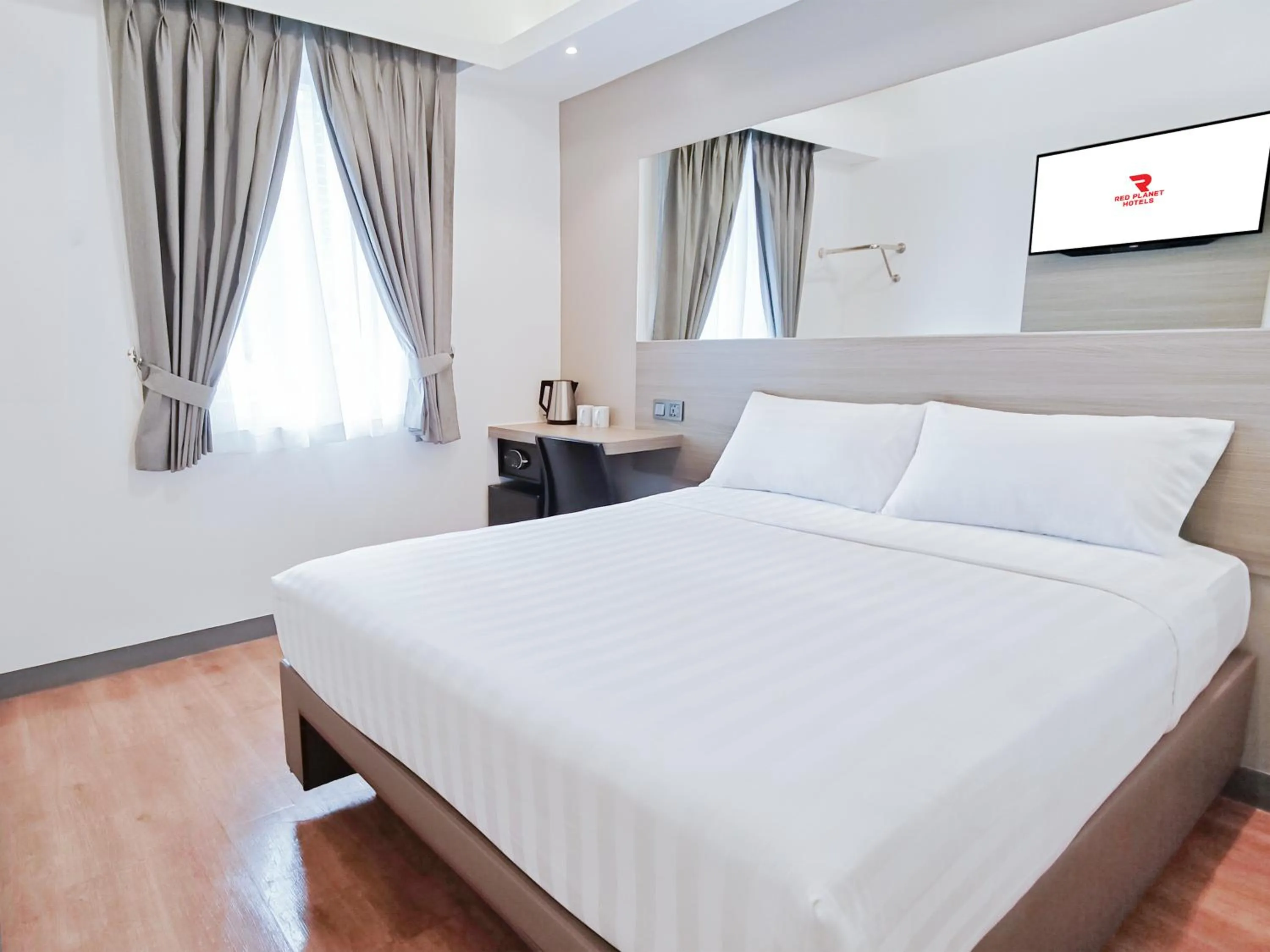 Bed in Red Planet Ortigas