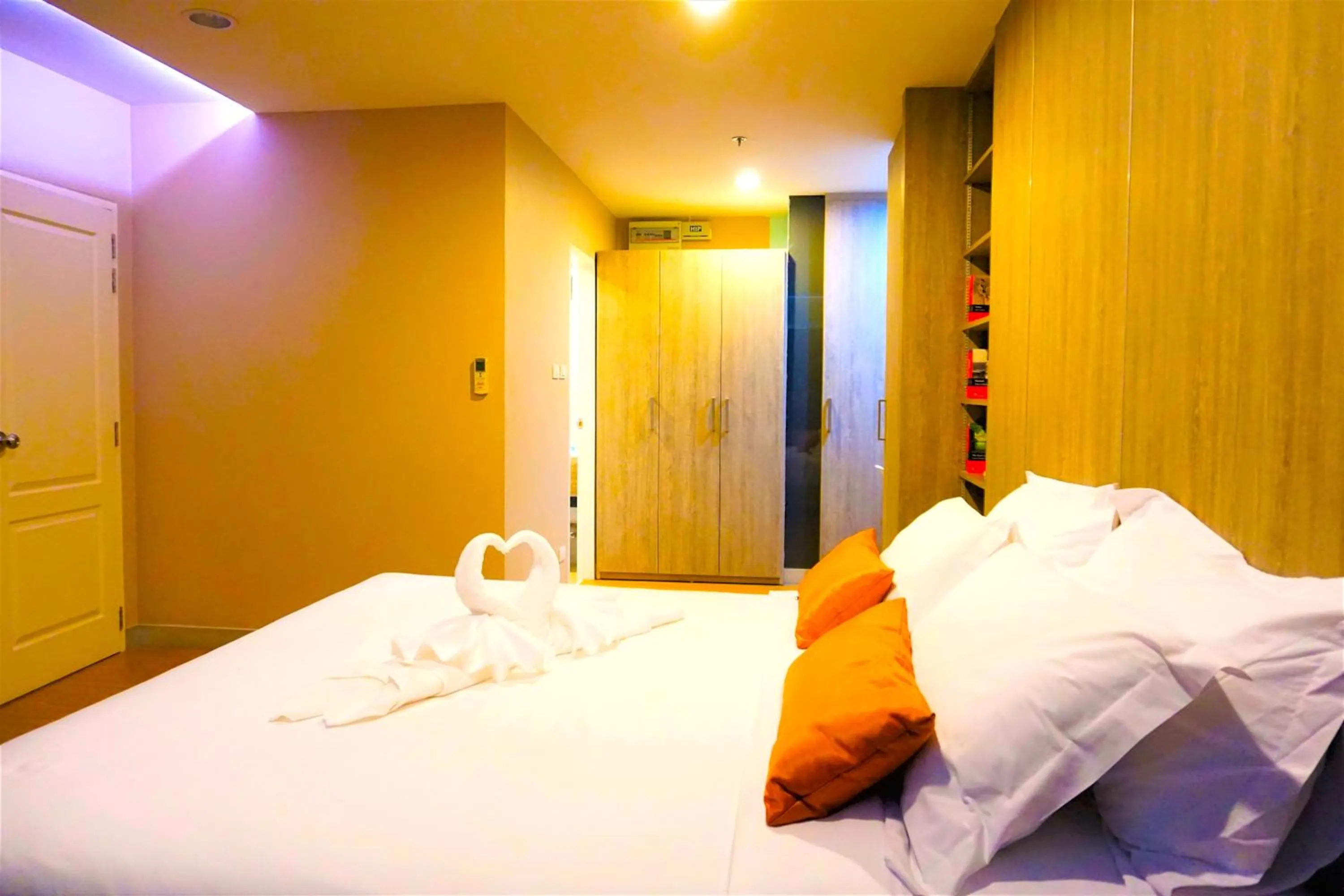 Bed in Nest n Rest Hotel