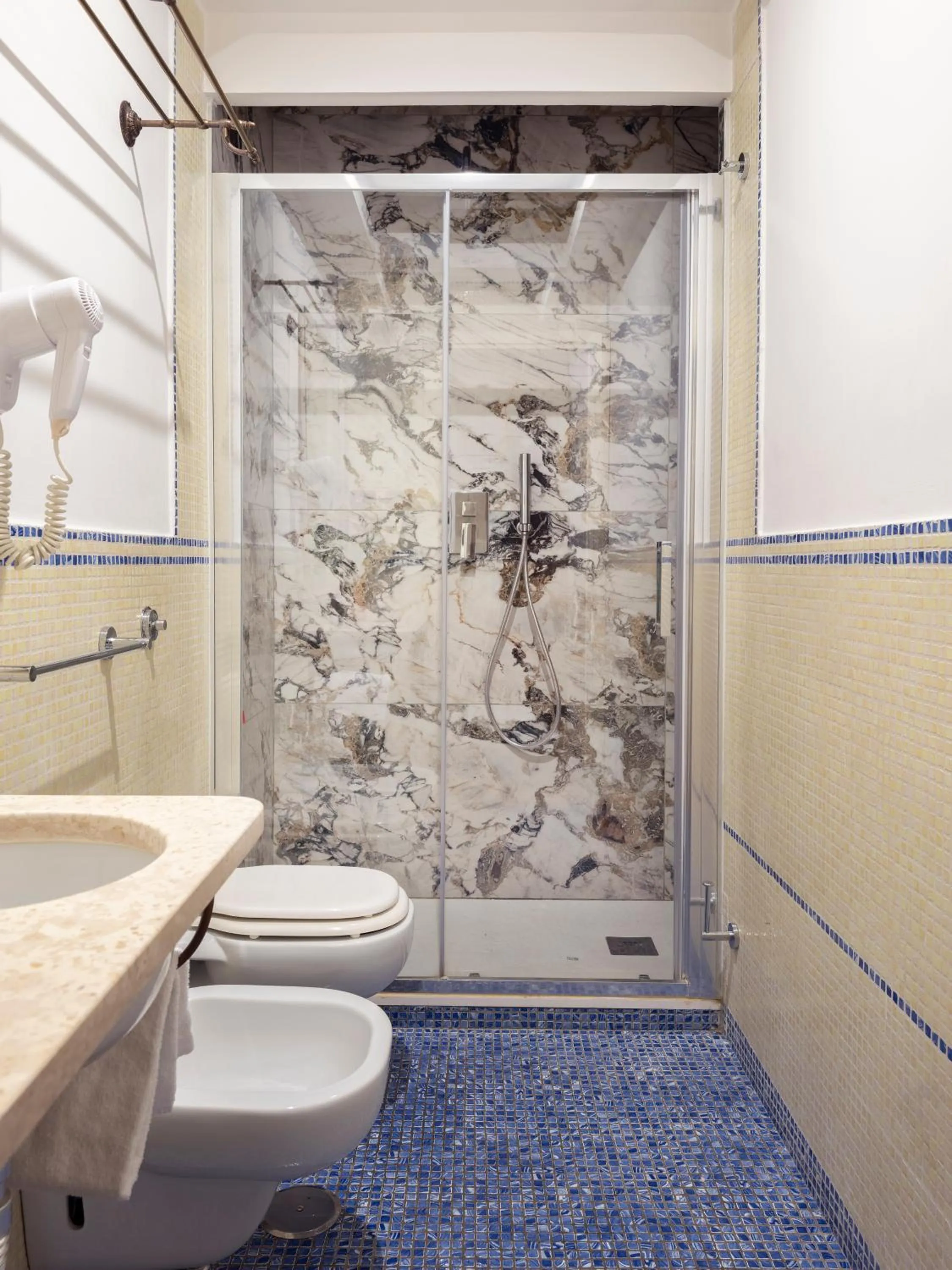 Bathroom in Grand Hotel Europa & Restaurant