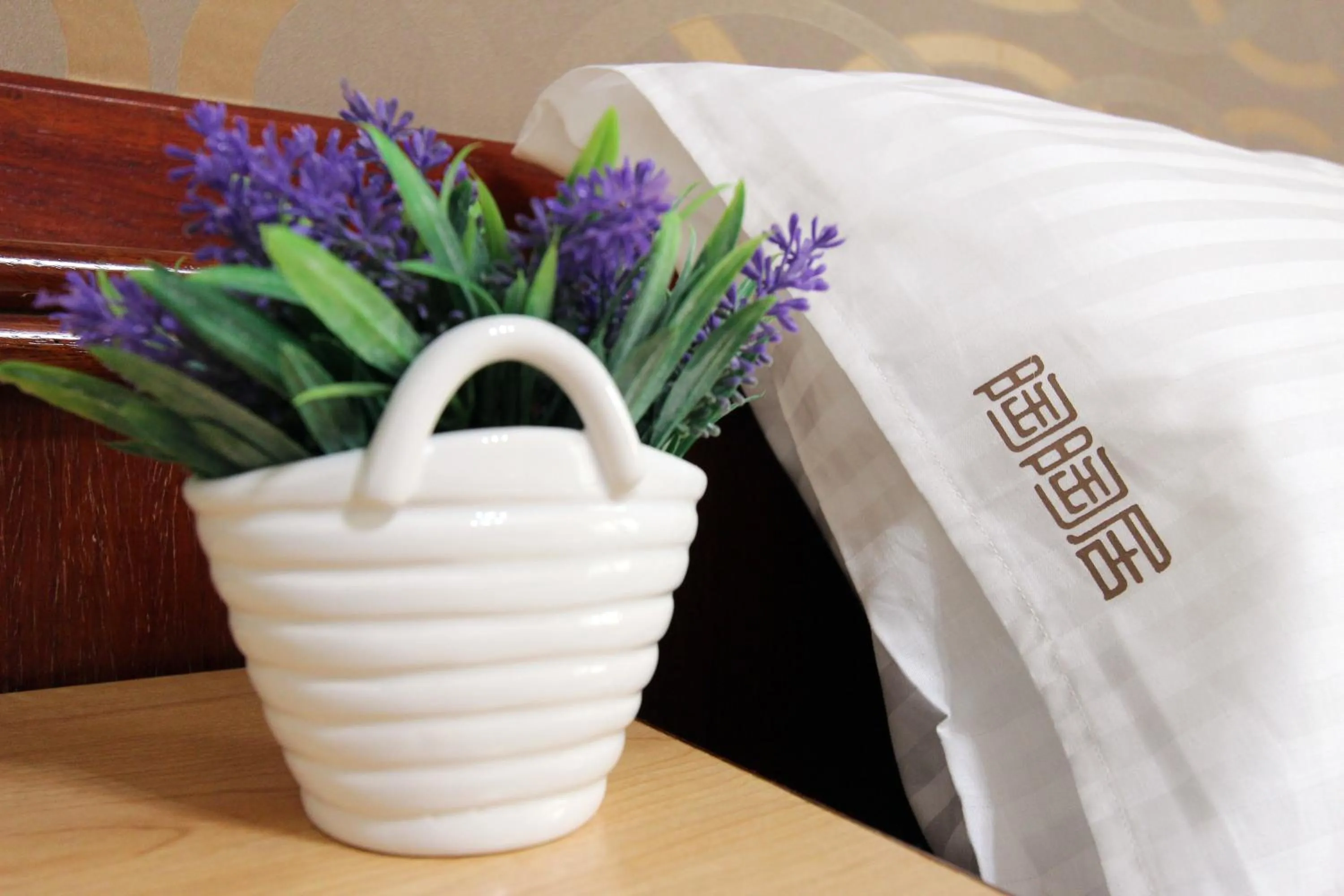 Decorative detail, Bed in Tau Tau Chu Hotel