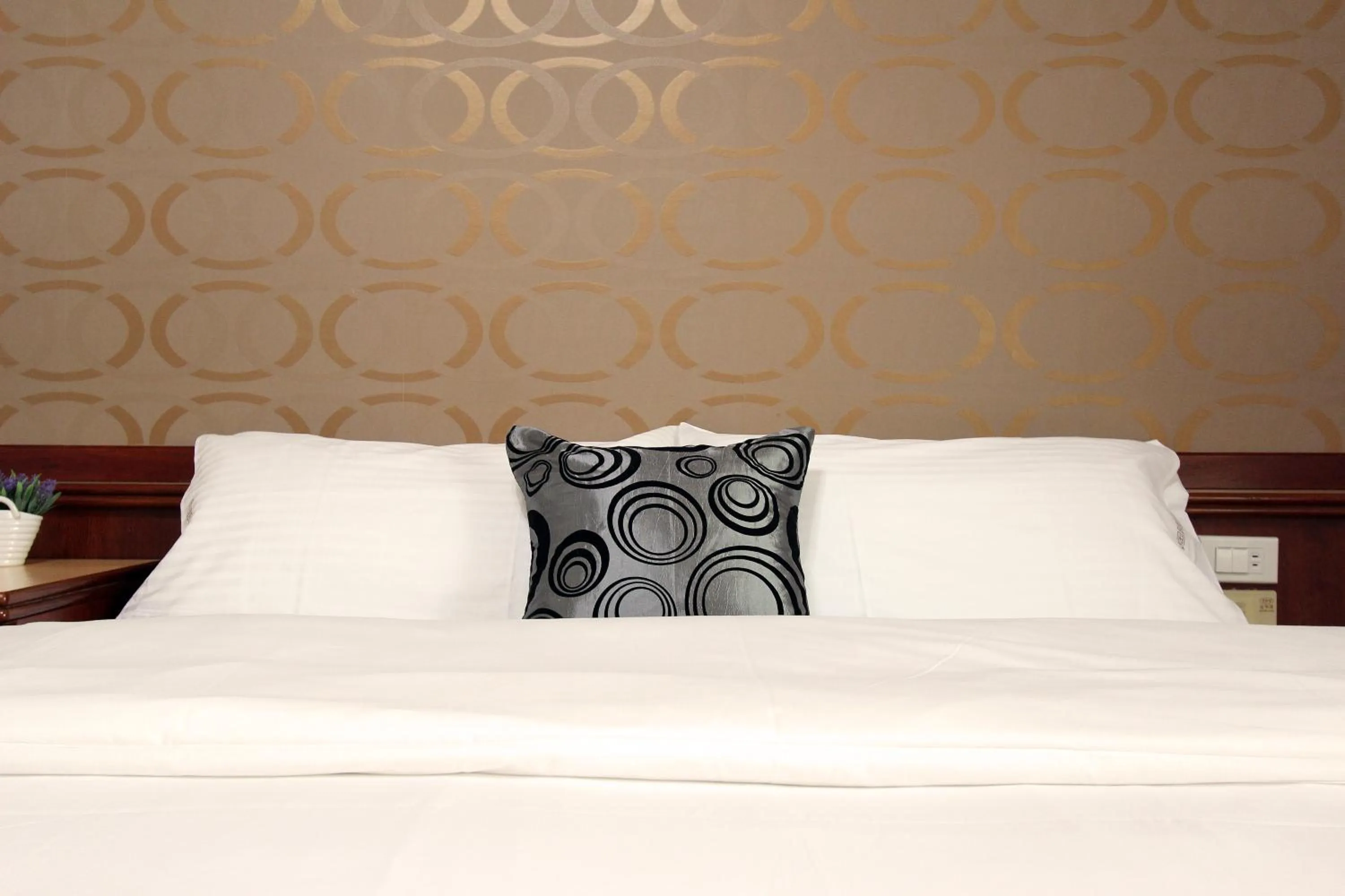 Bed in Tau Tau Chu Hotel