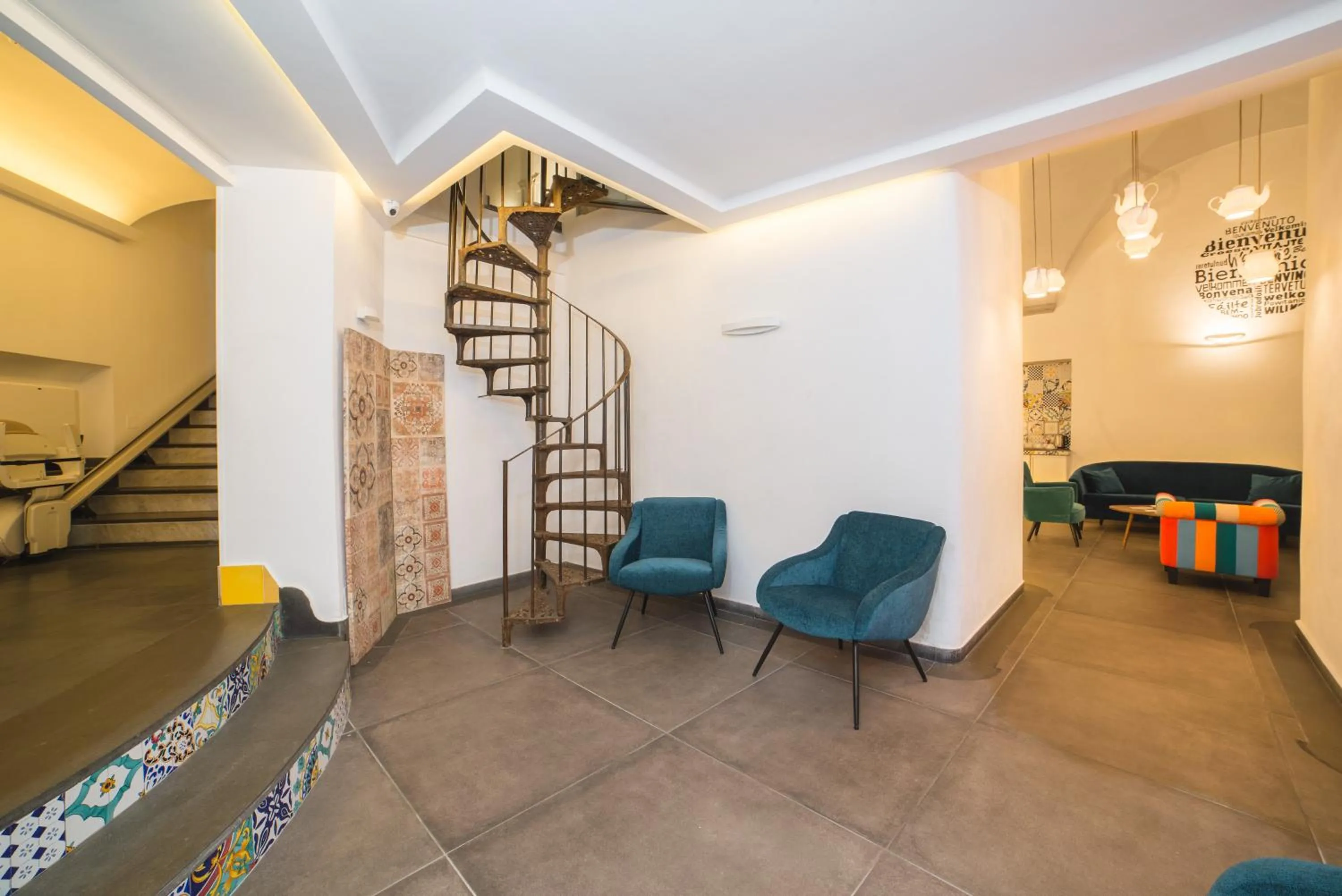 Communal lounge/ TV room in Airone Hotel