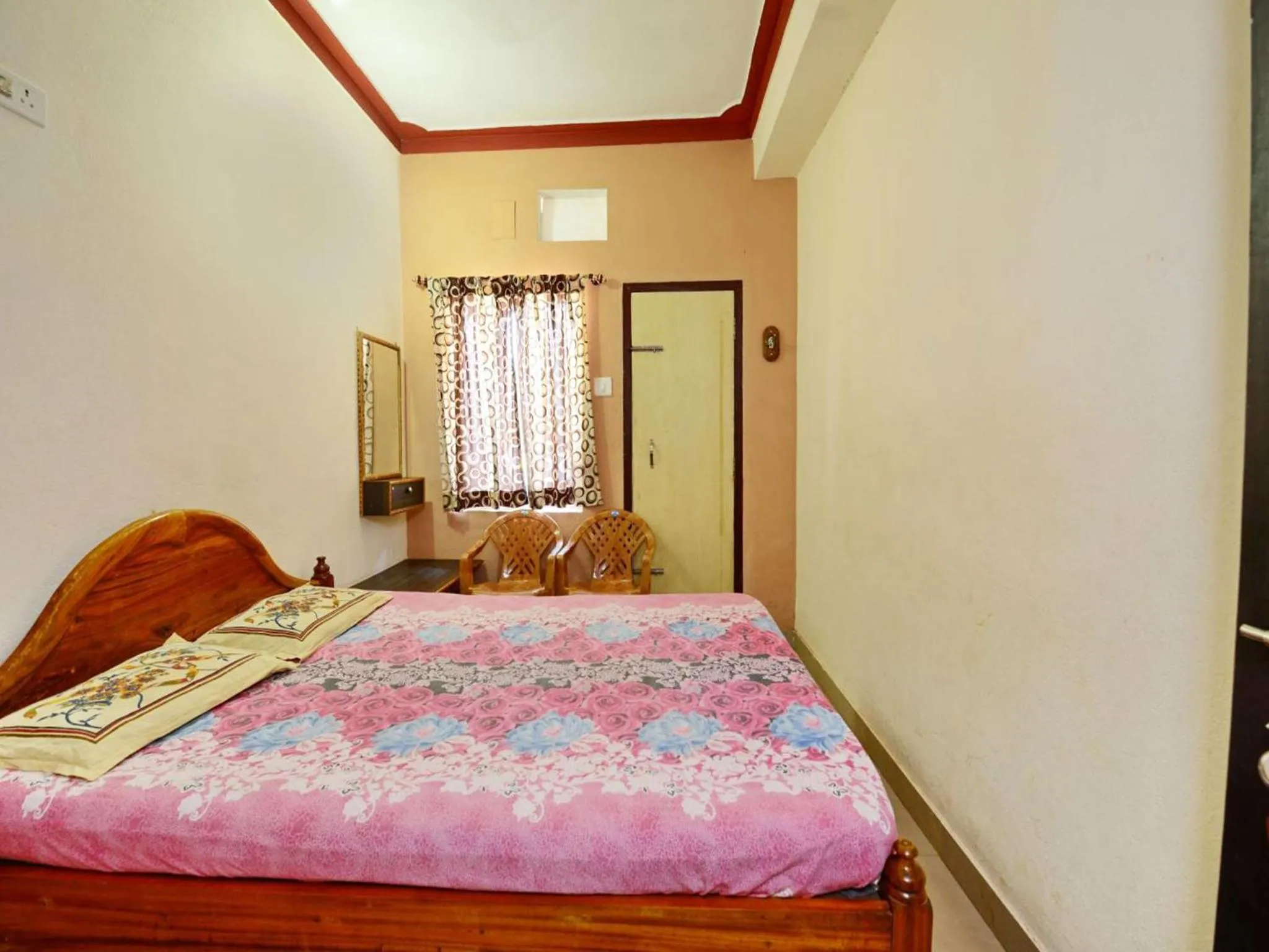 Photo of the whole room, Bed in Surya Inn