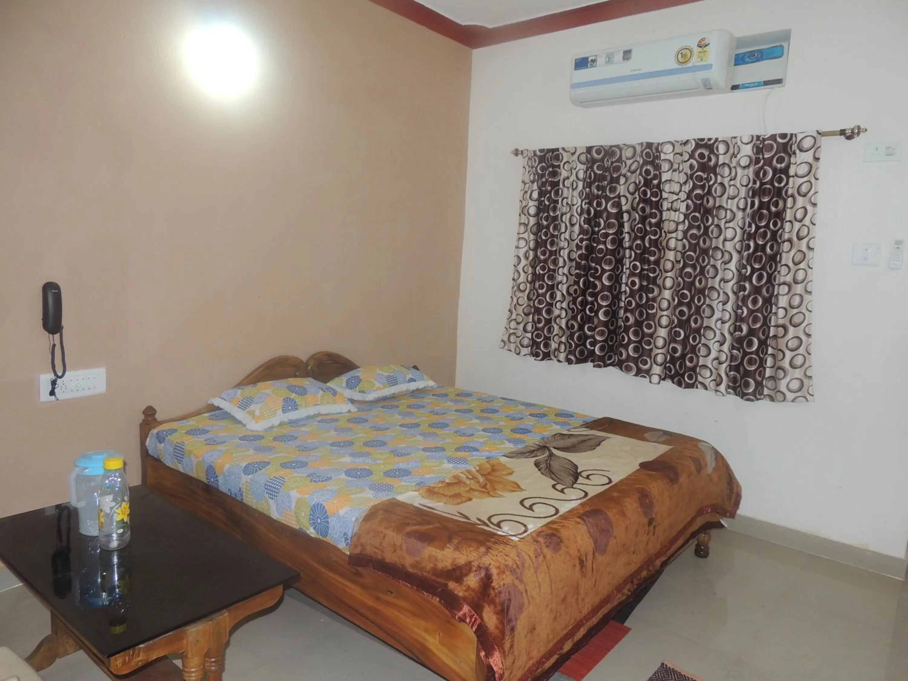 Photo of the whole room, Bed in Surya Inn