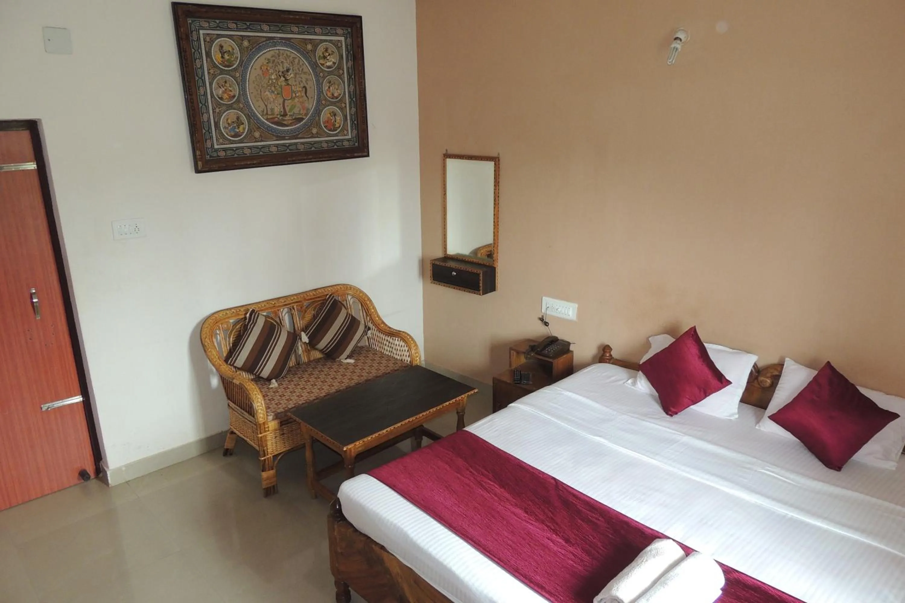Photo of the whole room, Bed in Surya Inn
