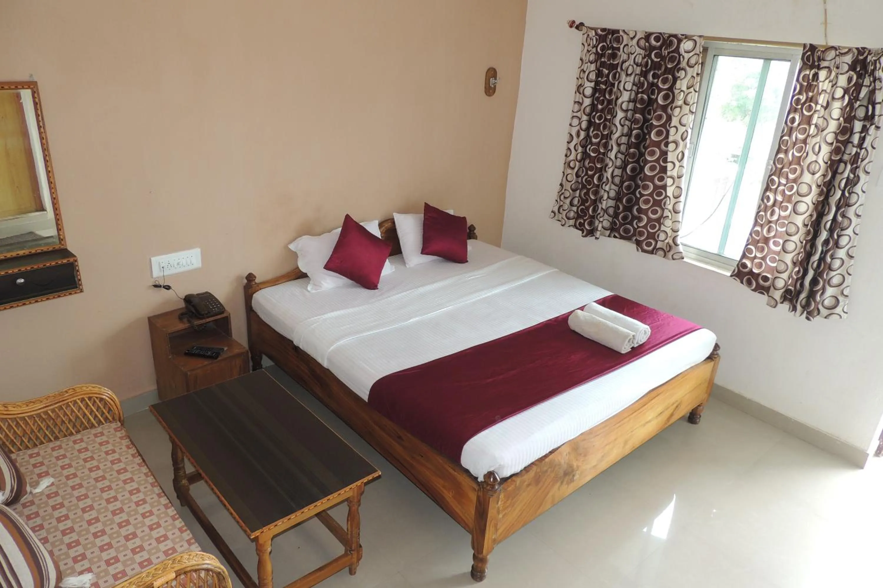 Photo of the whole room, Bed in Surya Inn