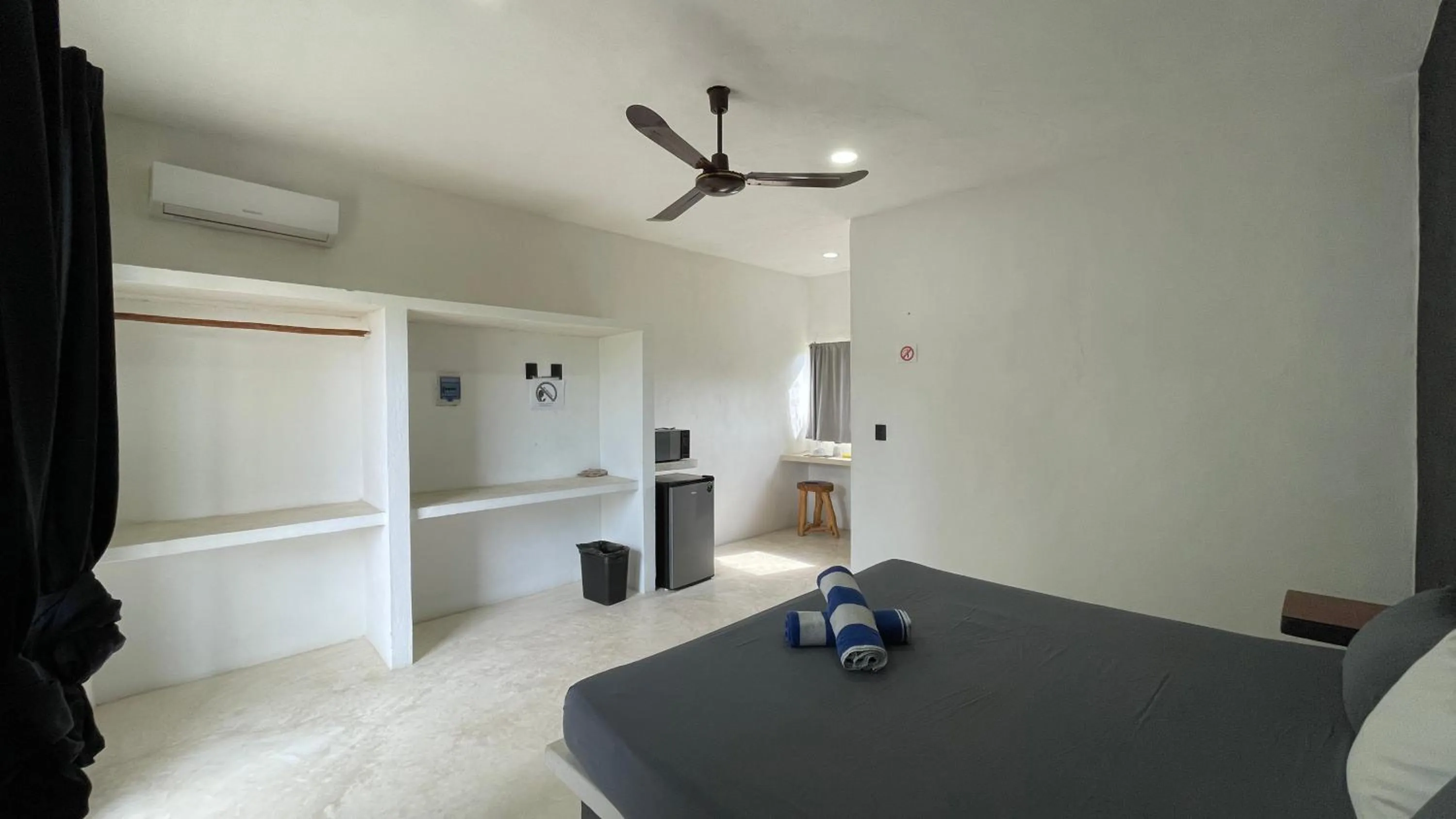 Photo of the whole room, Bed in Casa Tekio Holbox By Kin Studios