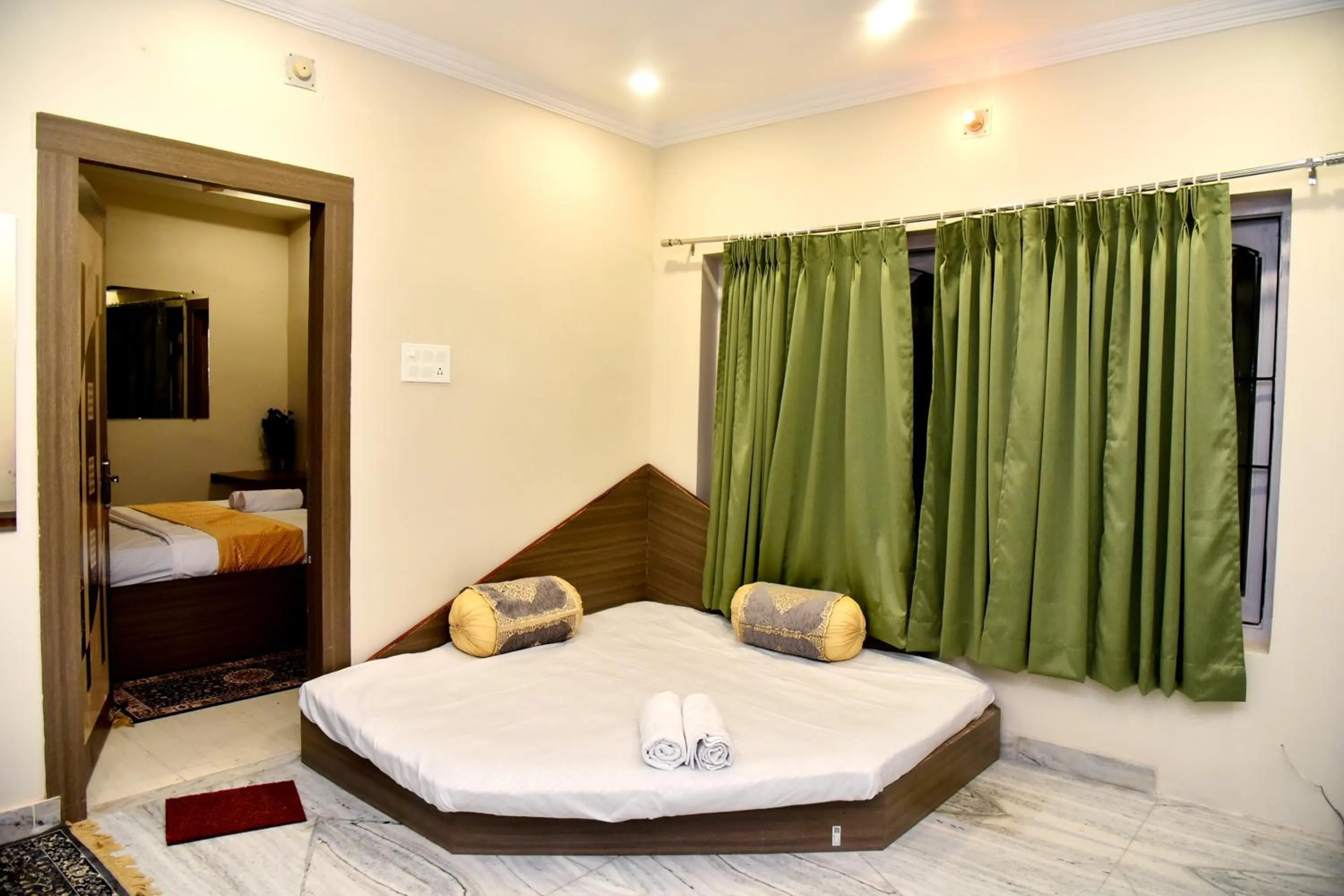 Living room, Bed in Bluebells Varanasi