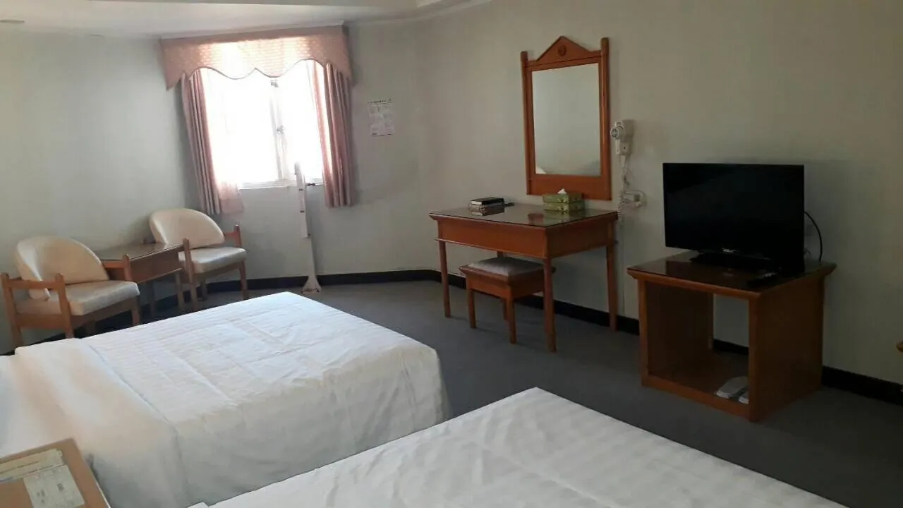 Photo of the whole room, Bed in Kenting City Gate Hotel