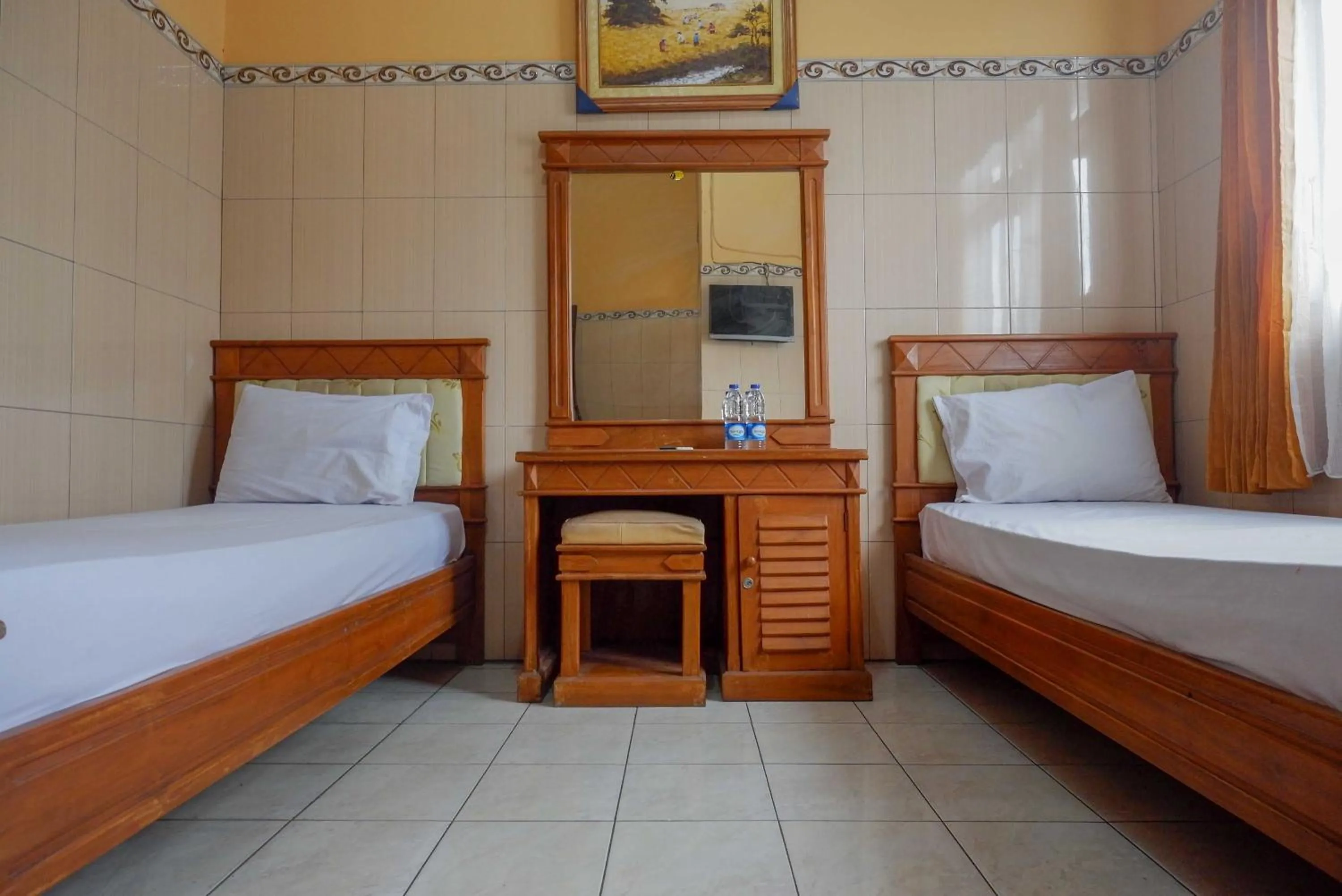 Bed in Urbanview Hotel Anugrah Kendal by RedDoorz