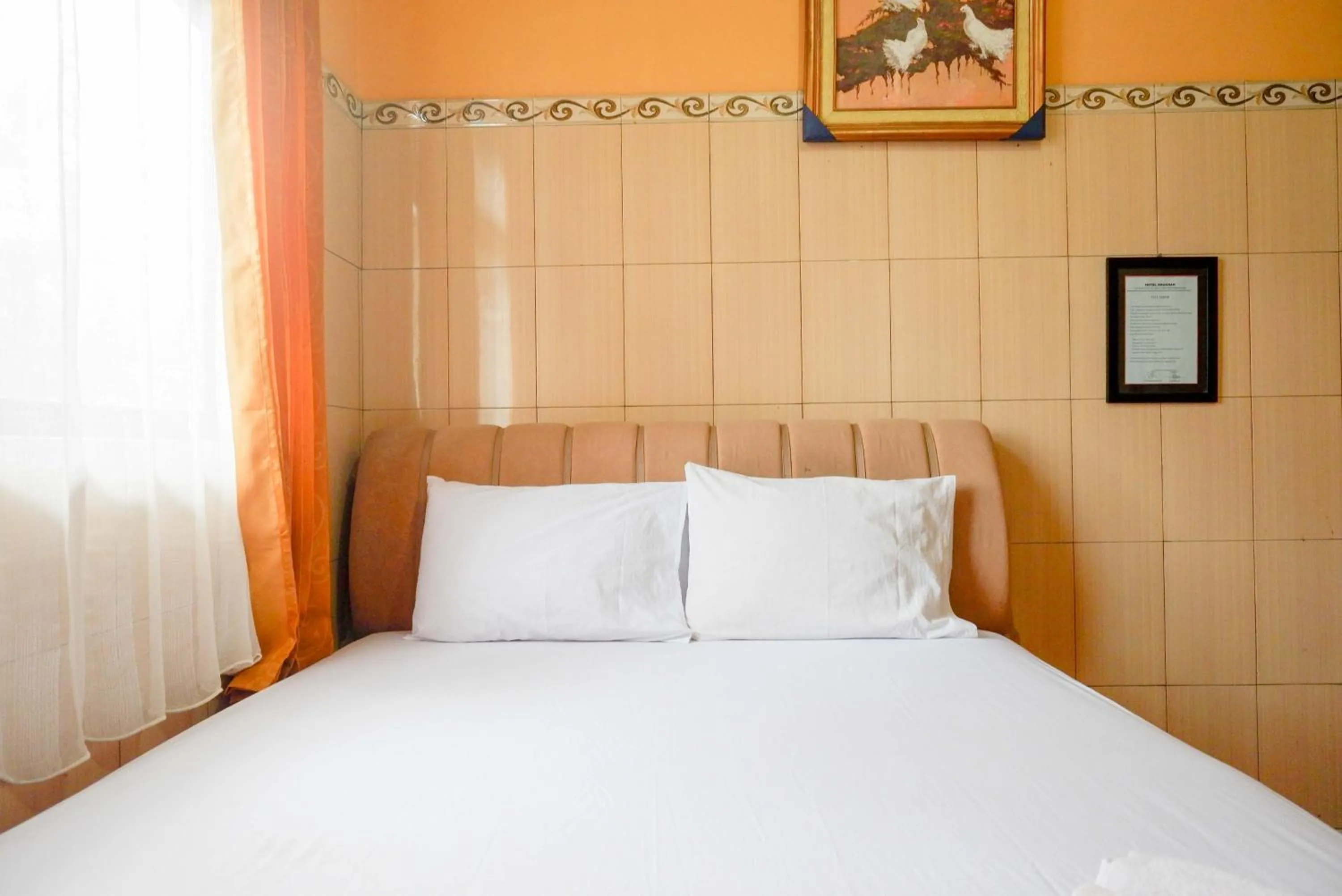 Bed in Urbanview Hotel Anugrah Kendal by RedDoorz