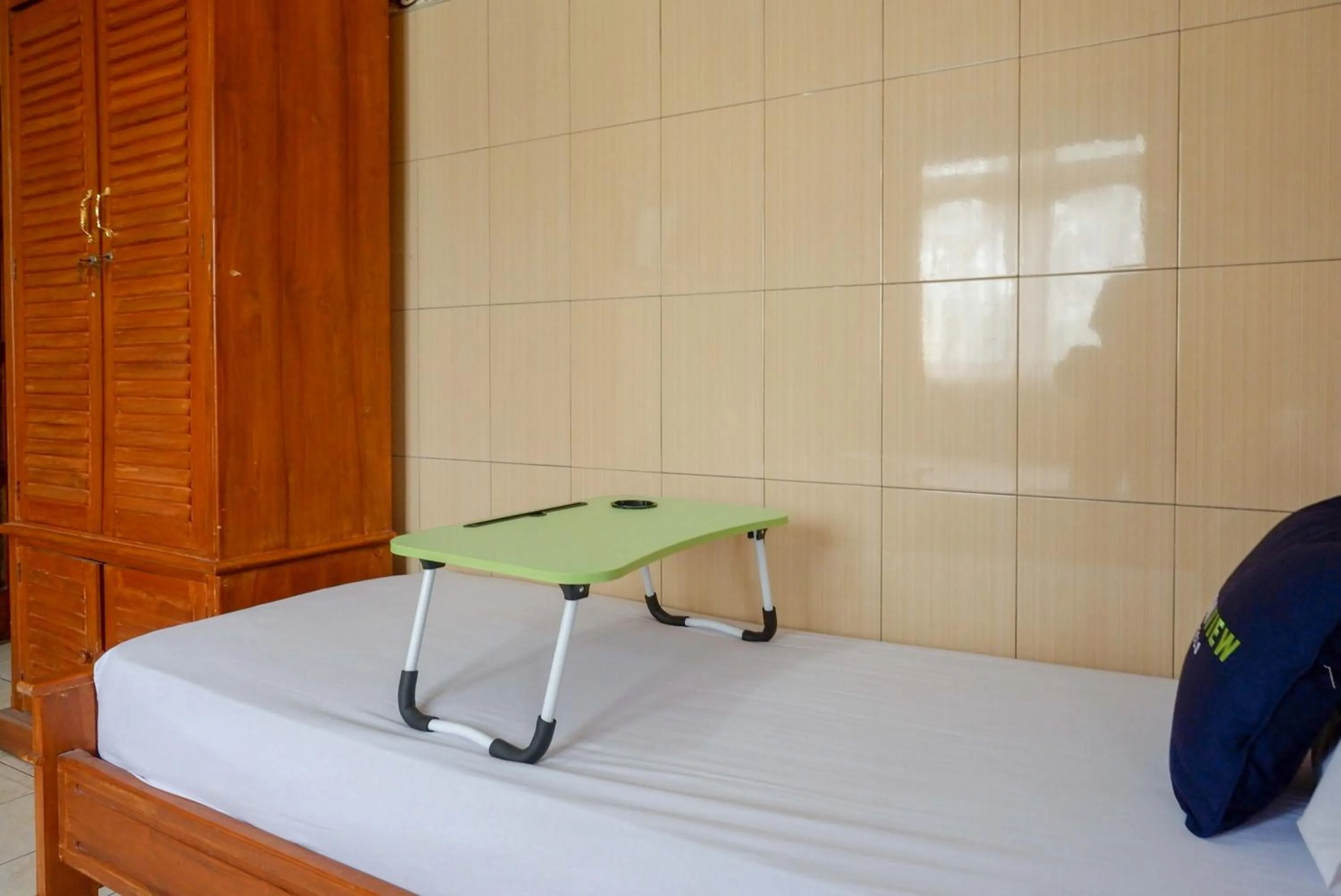 Bed in Urbanview Hotel Anugrah Kendal by RedDoorz