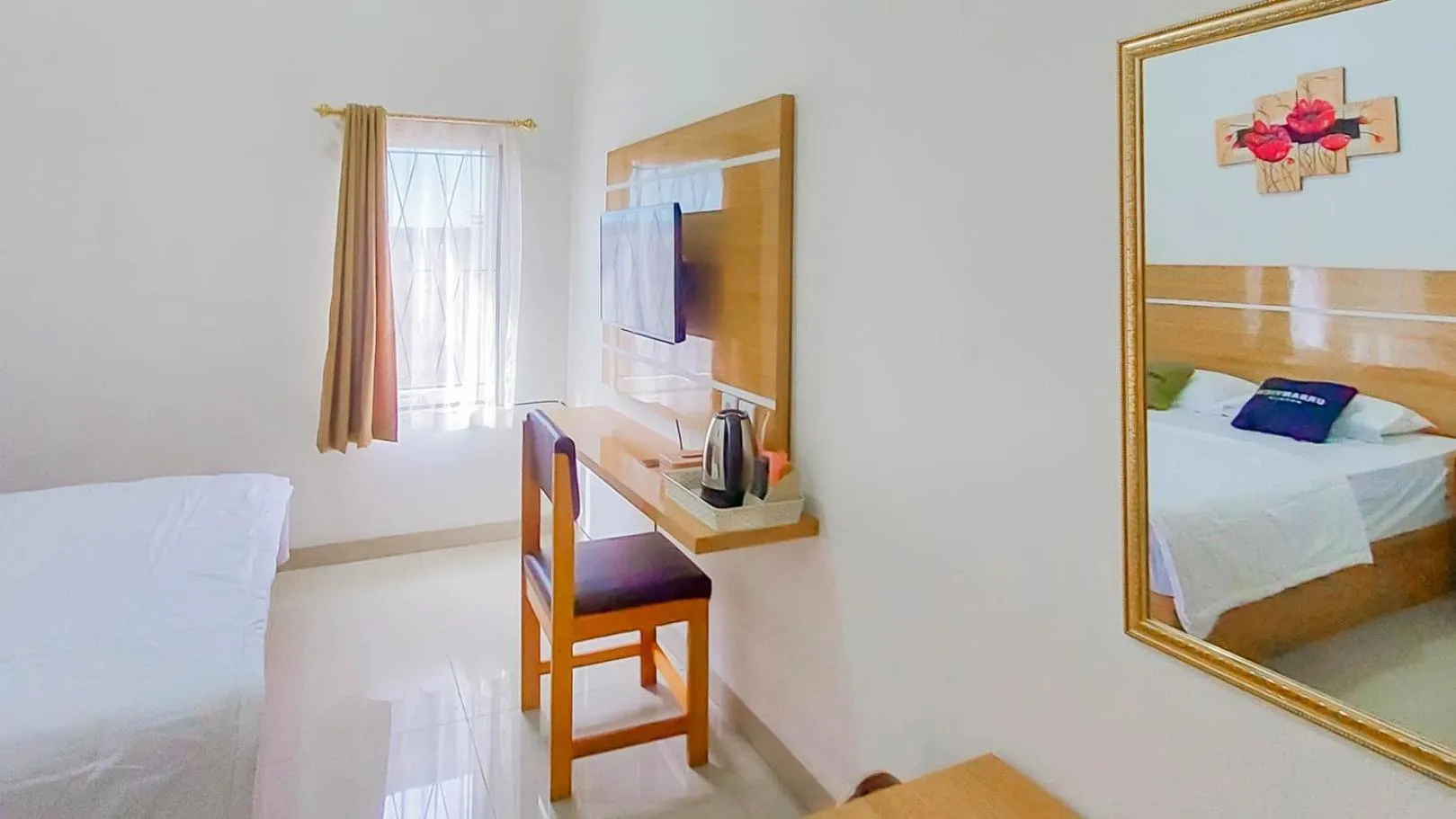 Bed in Urbanview Hotel Bundaran Besar Palangkaraya by RedDoorz