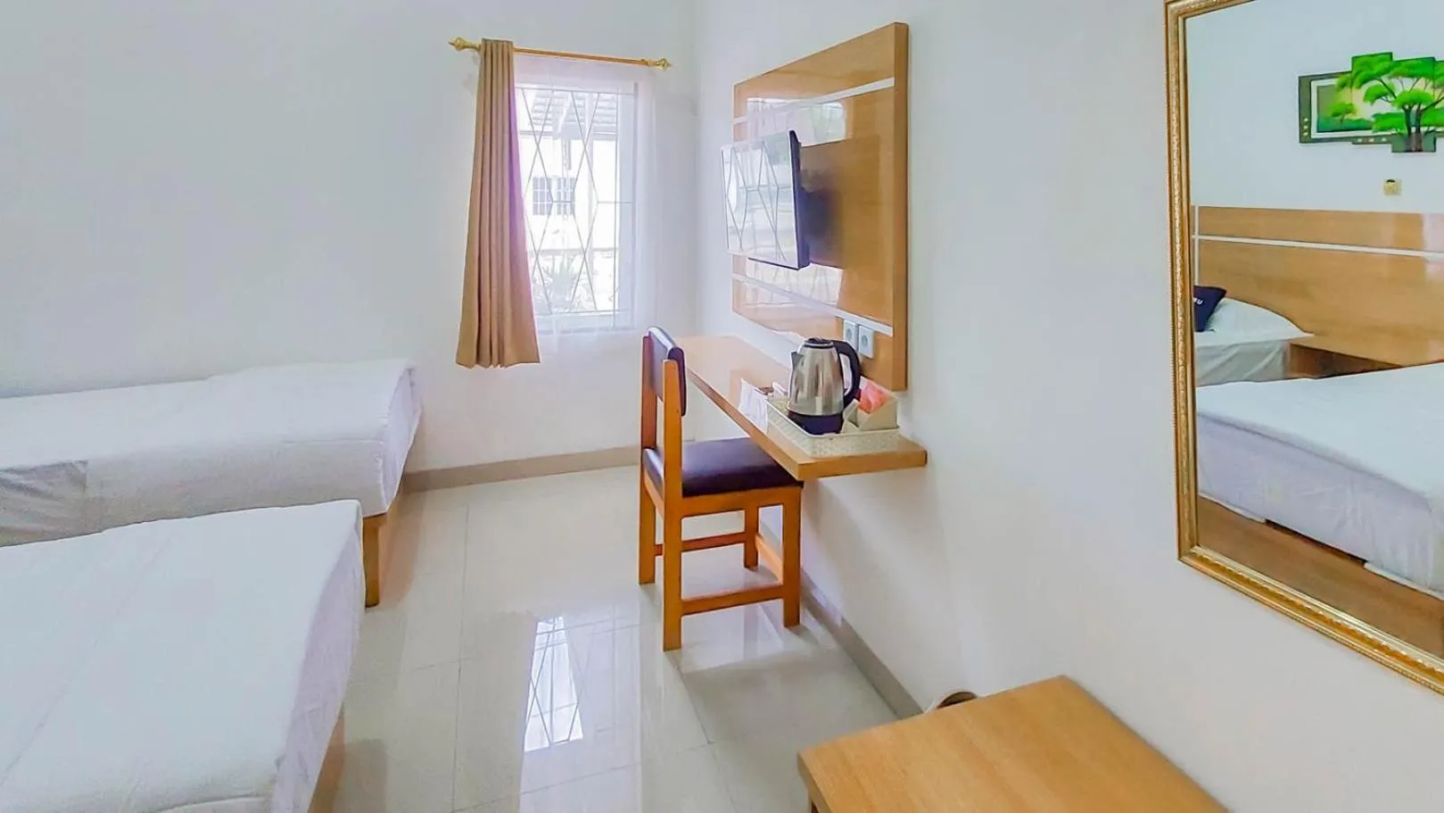 Bed in Urbanview Hotel Bundaran Besar Palangkaraya by RedDoorz