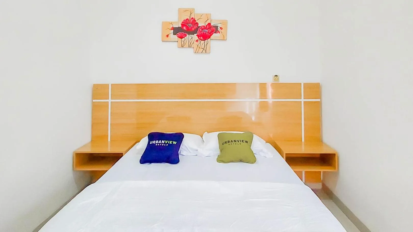 Bed in Urbanview Hotel Bundaran Besar Palangkaraya by RedDoorz
