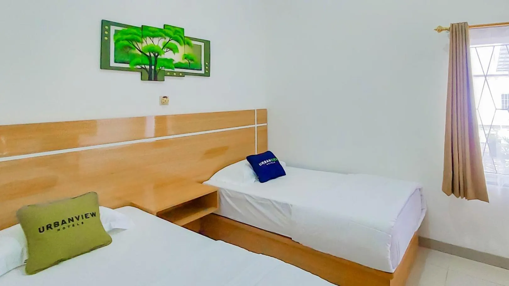 Bed in Urbanview Hotel Bundaran Besar Palangkaraya by RedDoorz