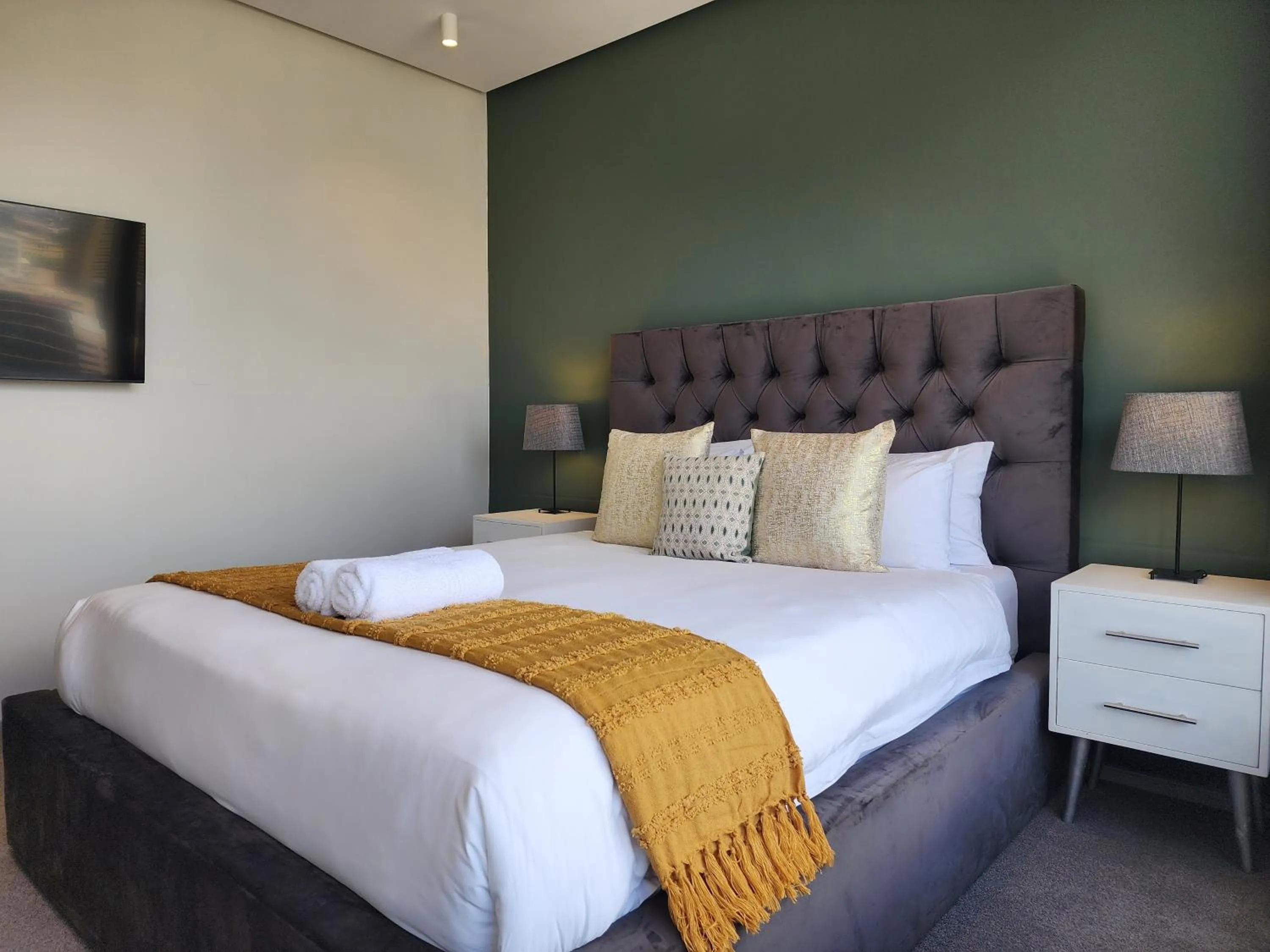 Bed in 117 on Strand Luxury Apartments