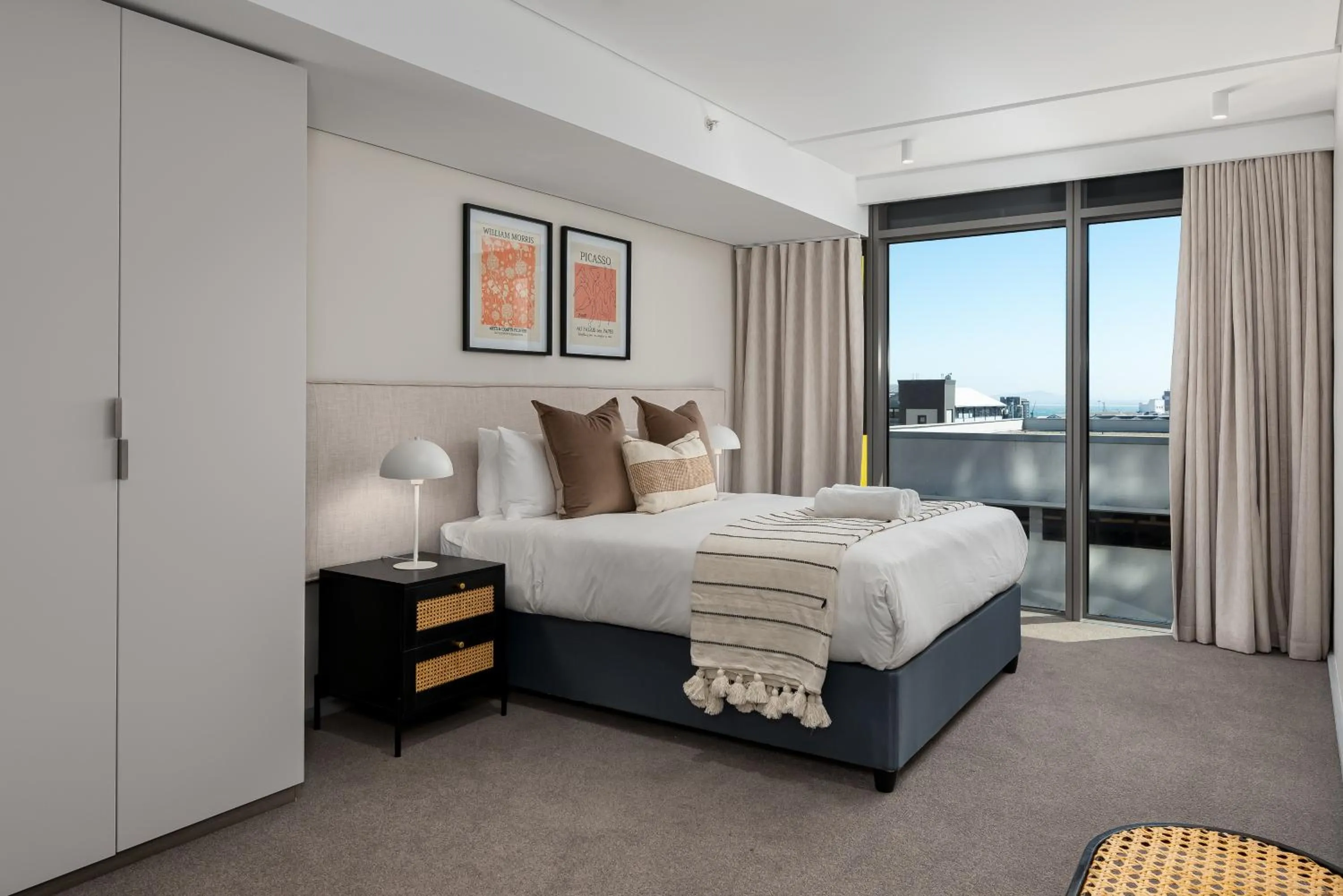 Bed in 117 on Strand Luxury Apartments