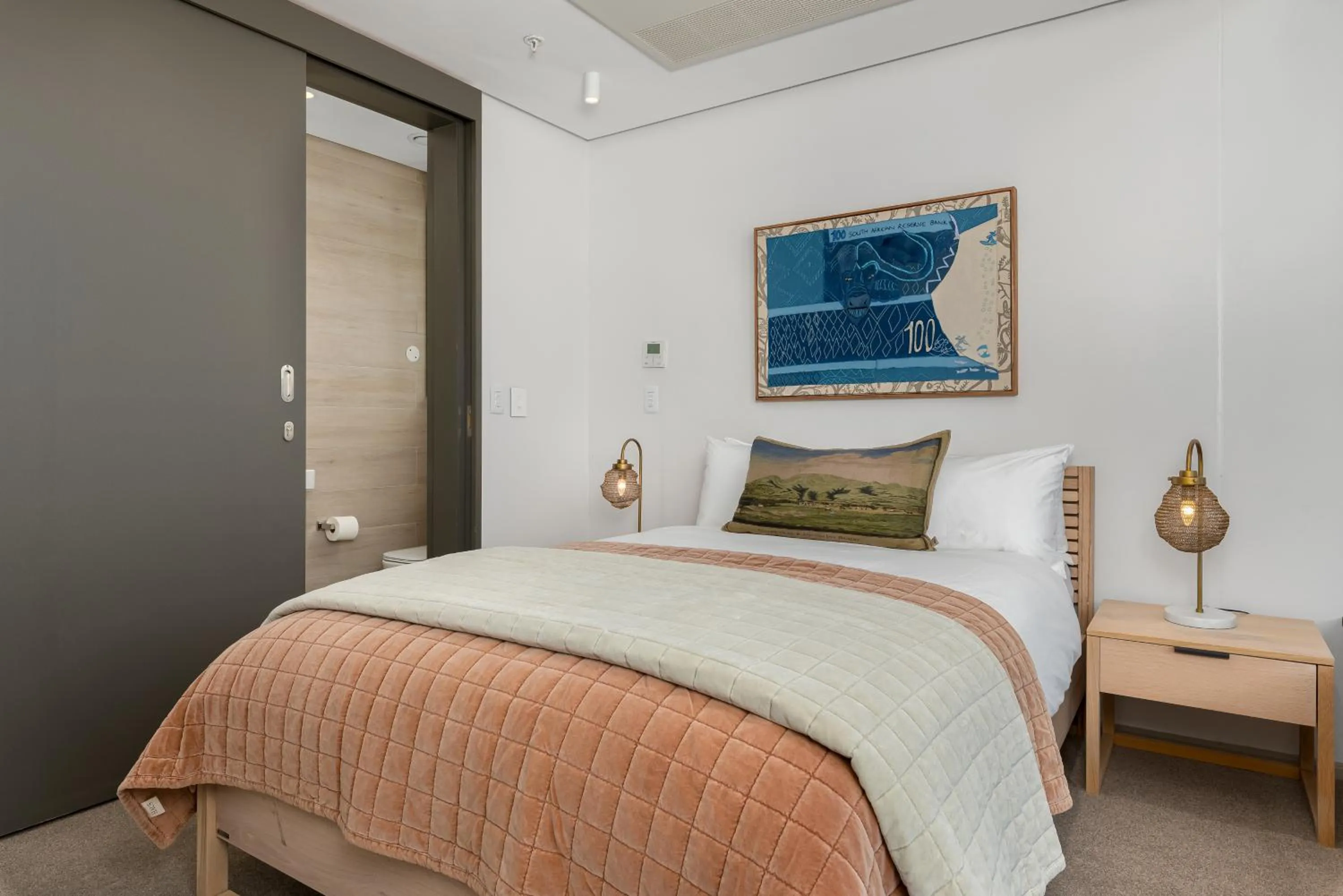 Bed in 117 on Strand Luxury Apartments