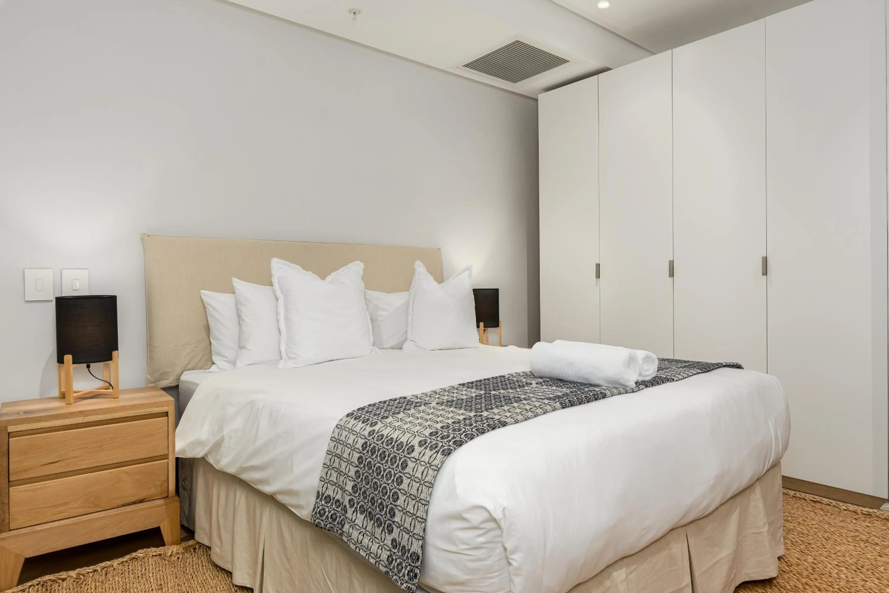 Bed in 117 on Strand Luxury Apartments