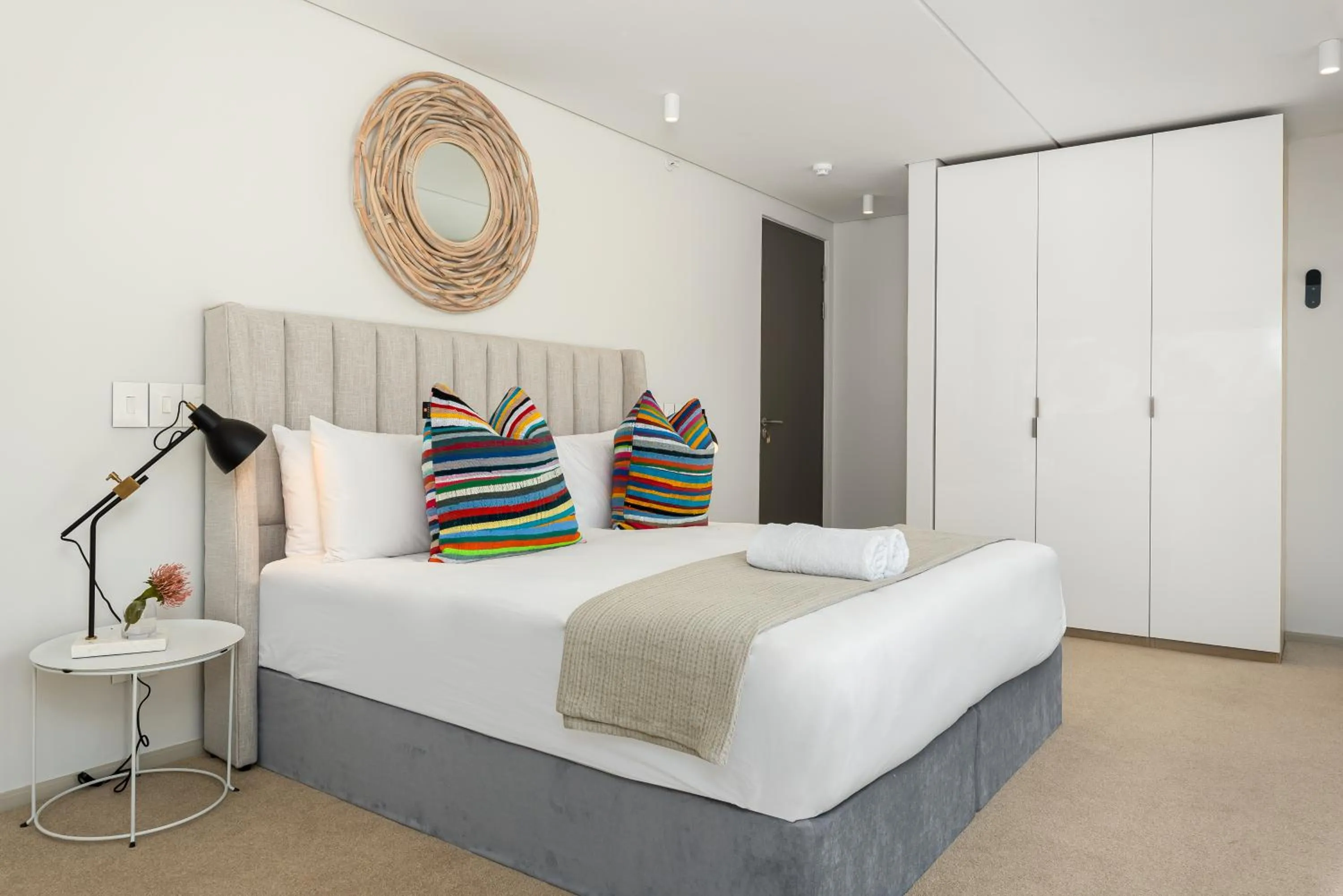 Bed in 117 on Strand Luxury Apartments