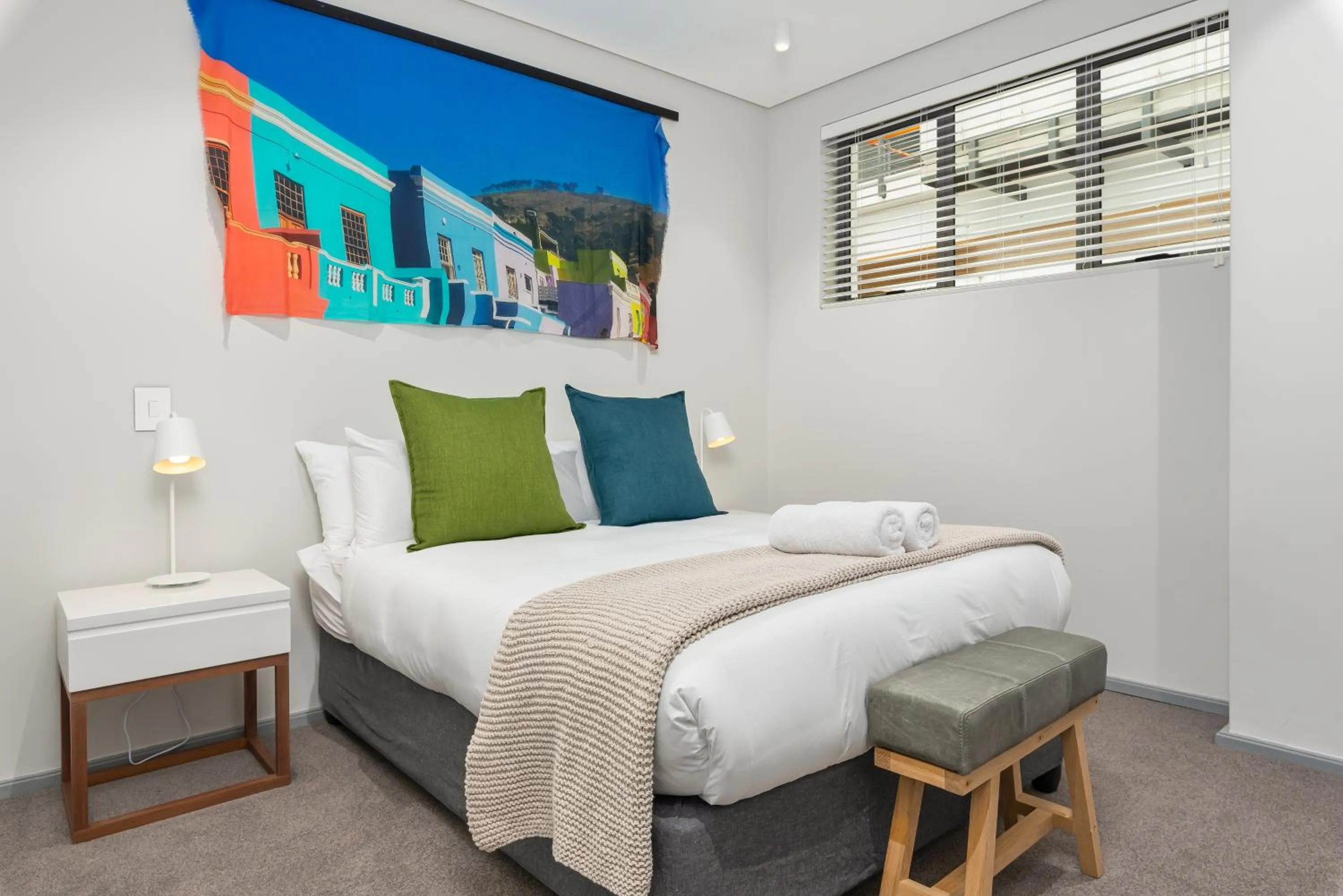 Bed in 117 on Strand Luxury Apartments