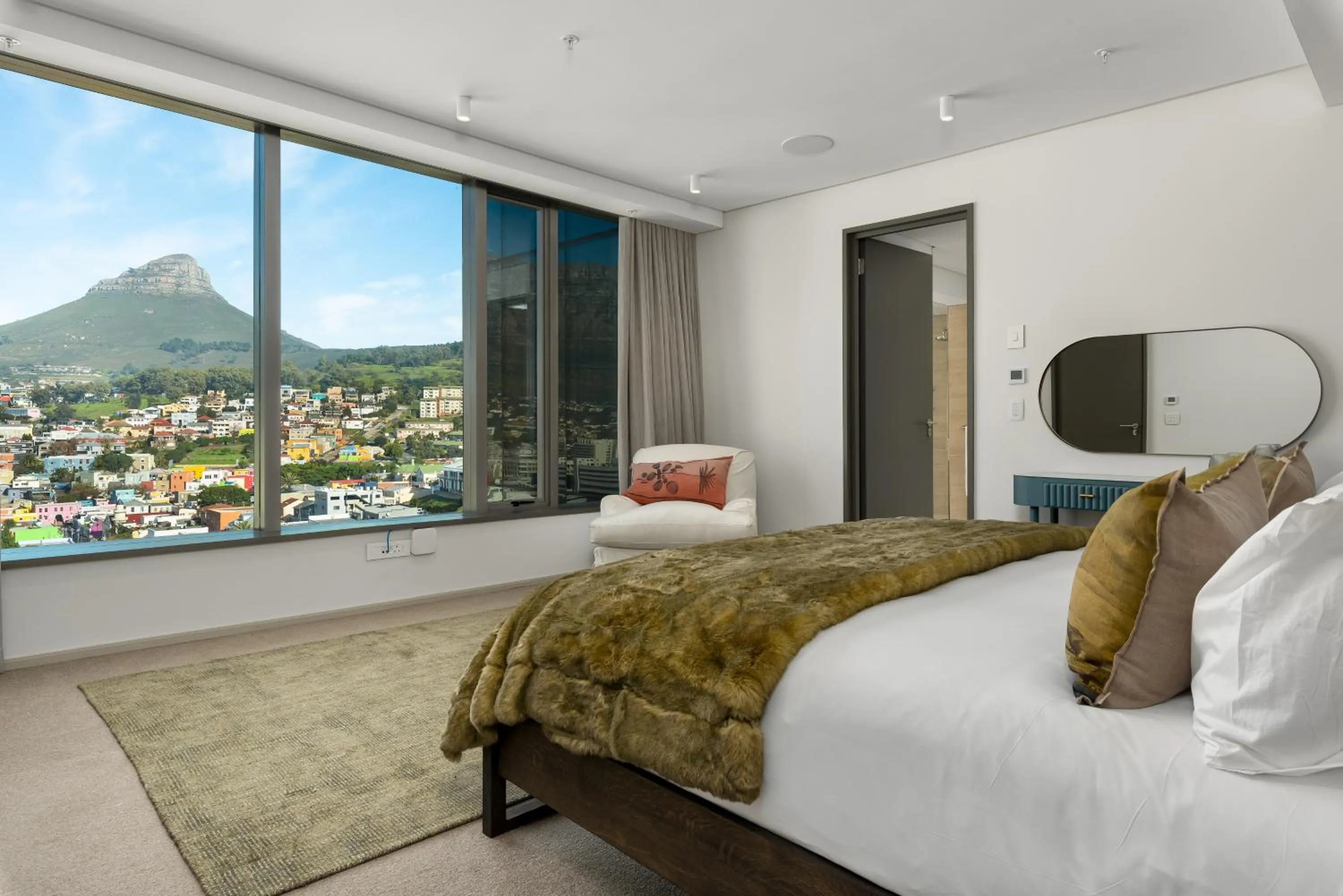 Bed in 117 on Strand Luxury Apartments