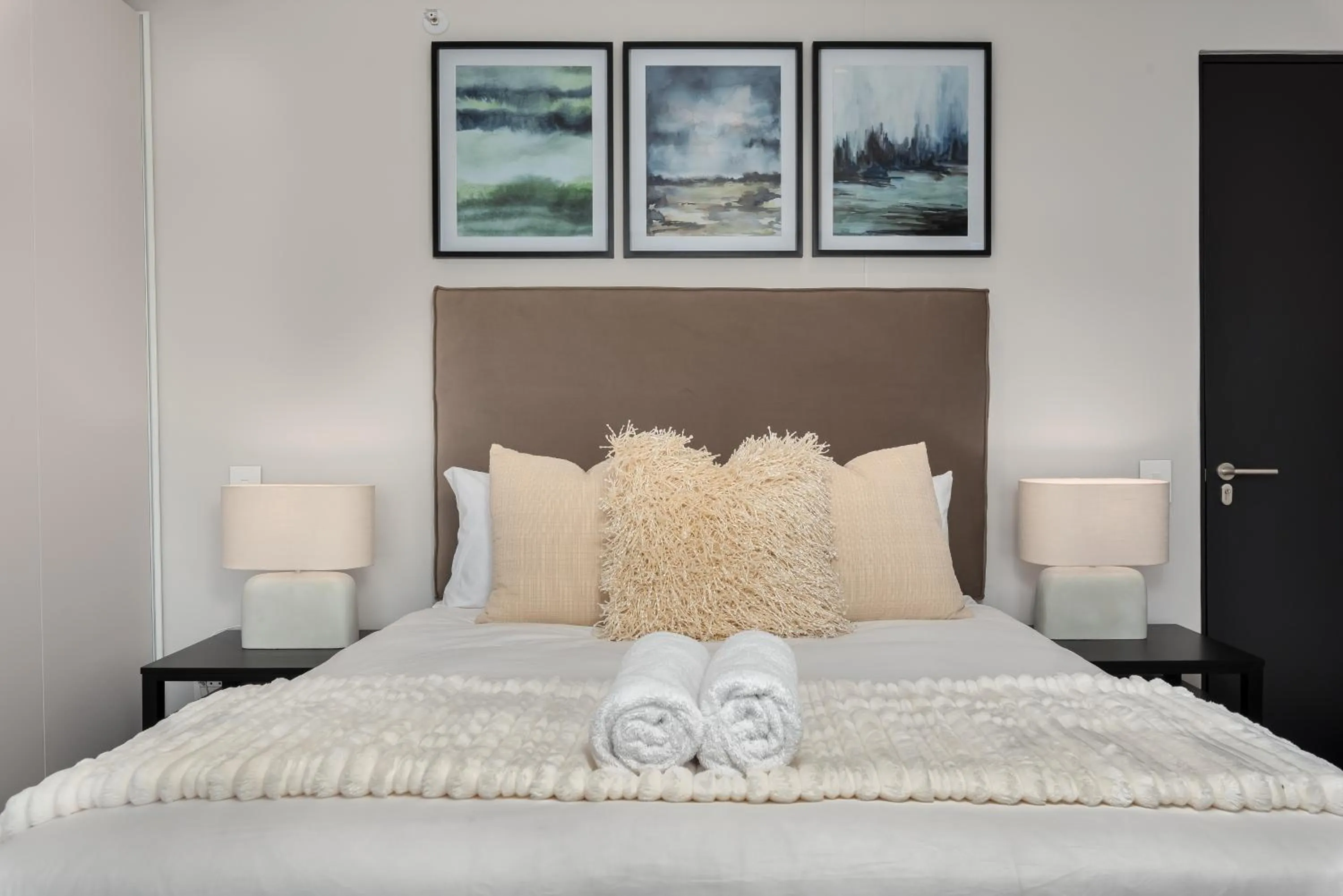 Bed in 117 on Strand Luxury Apartments