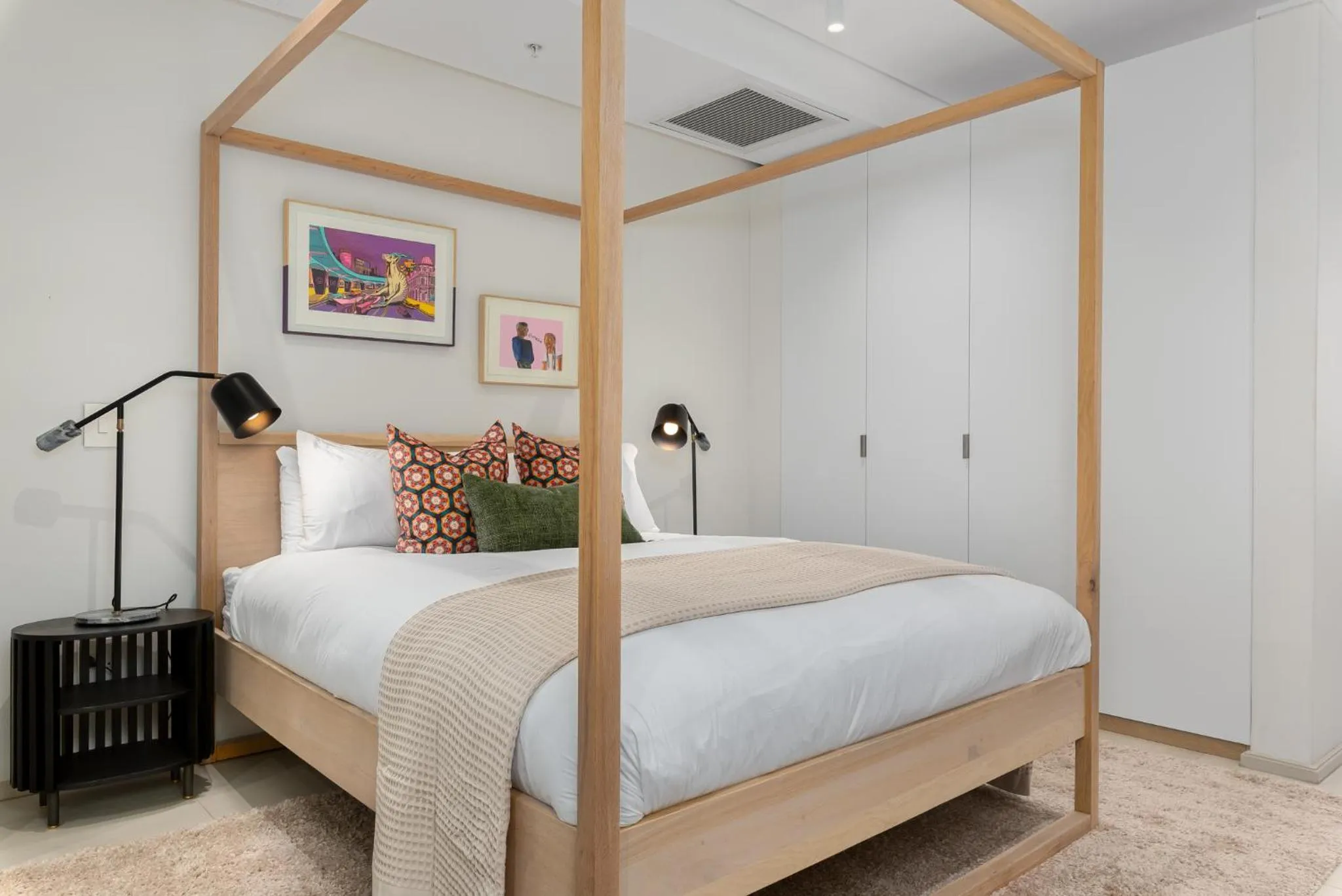 Bed in 117 on Strand Luxury Apartments