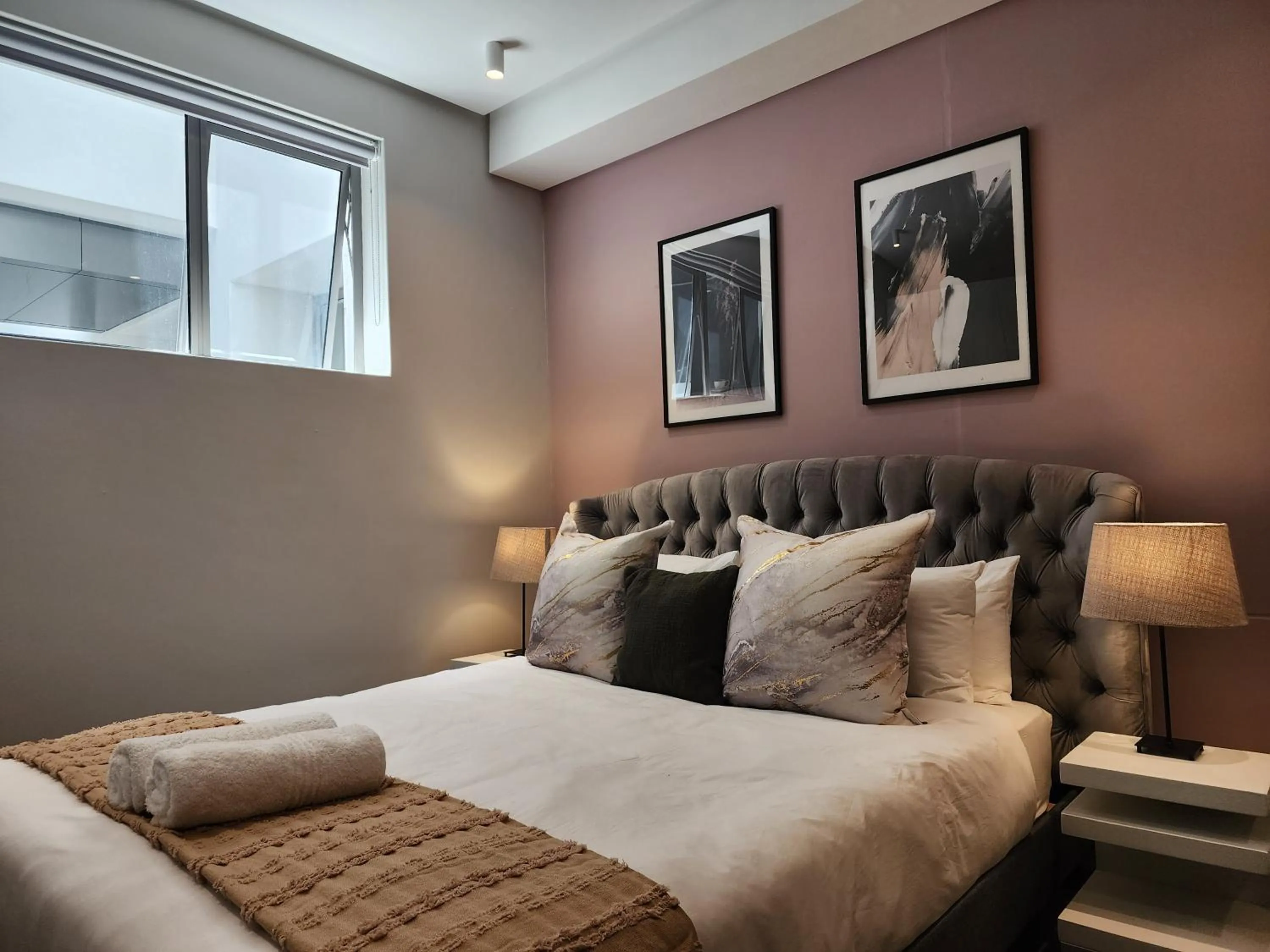 Bed in 117 on Strand Luxury Apartments