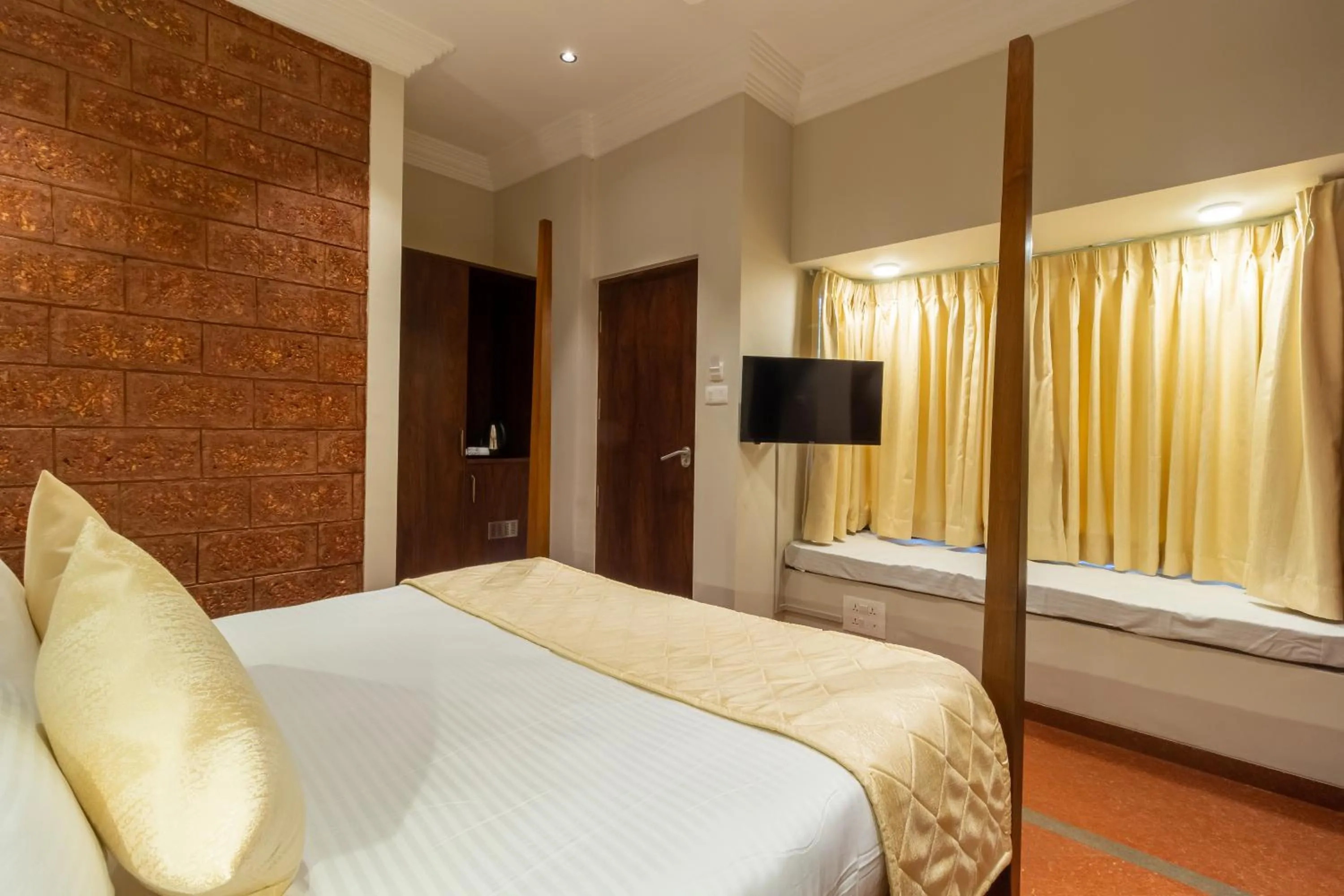 Bed in R R Heritage Resort Pure Vegetarian