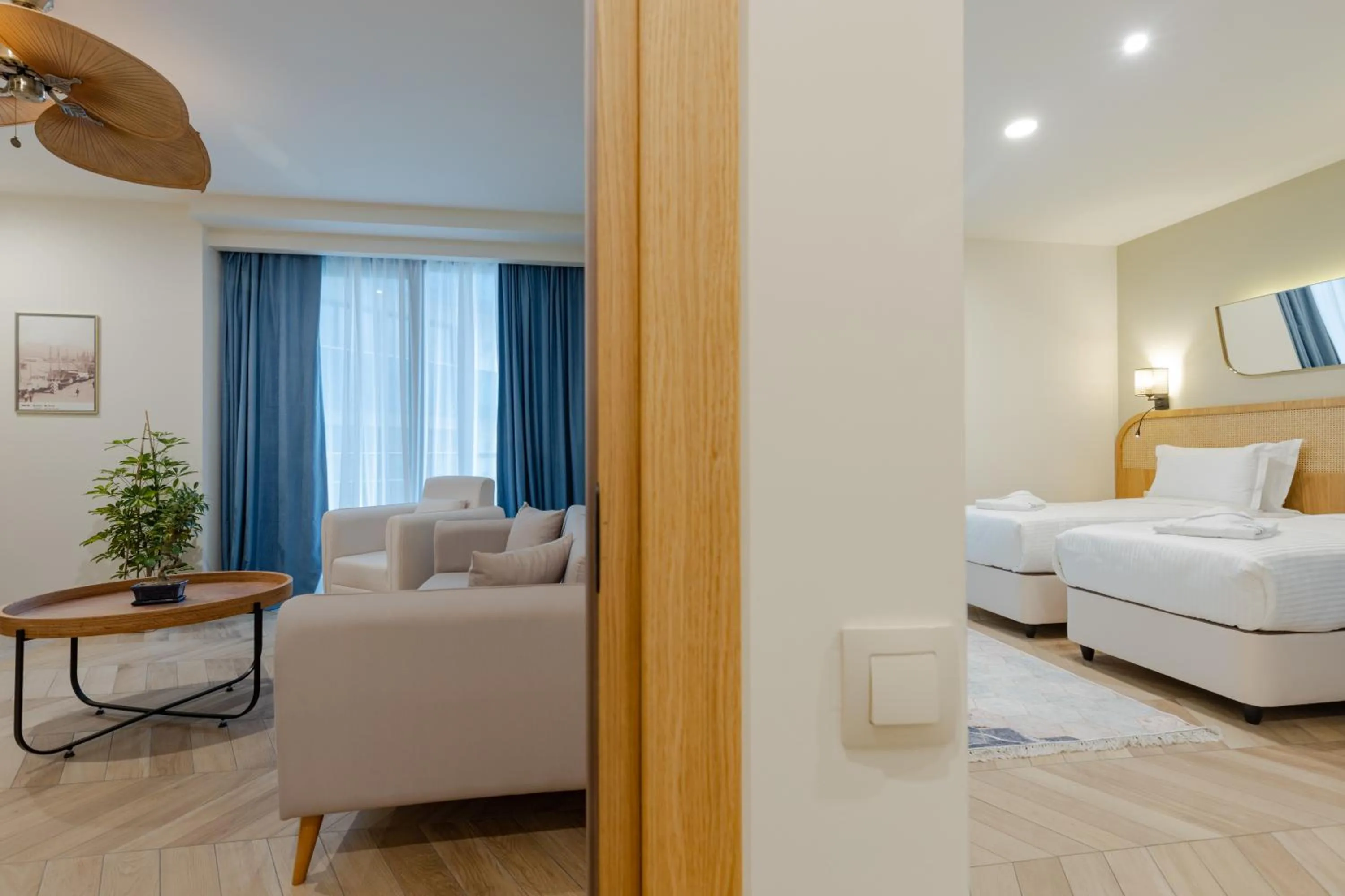 Living room, Bed in MiraMar Luxury Residences